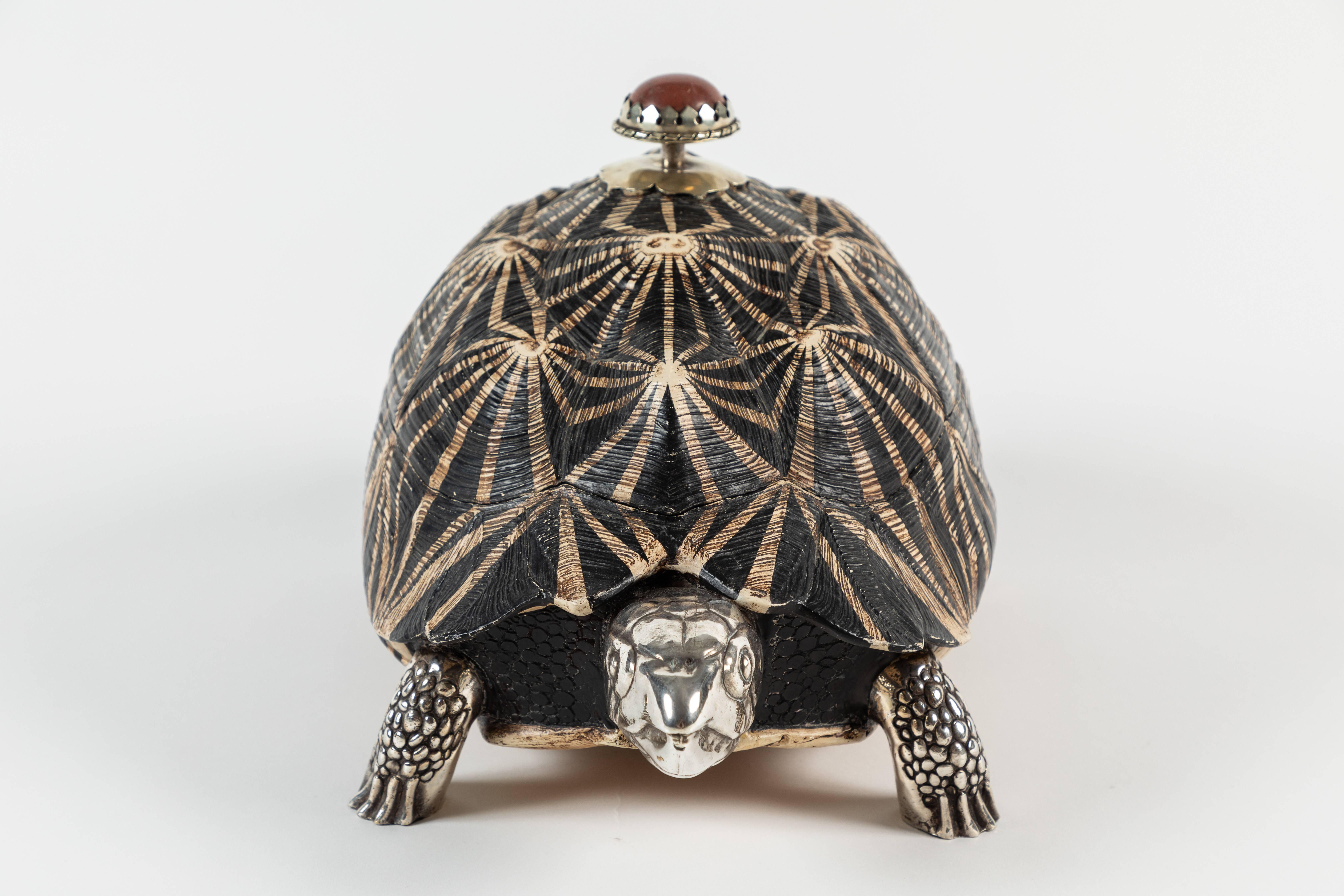 Realistically cast large resin and silver plate turtle box by English designer Anthony Redmile. The shell features a realistic texture and a black and white geometric design. the legs and head cast in silver plated metal are also very convincingly