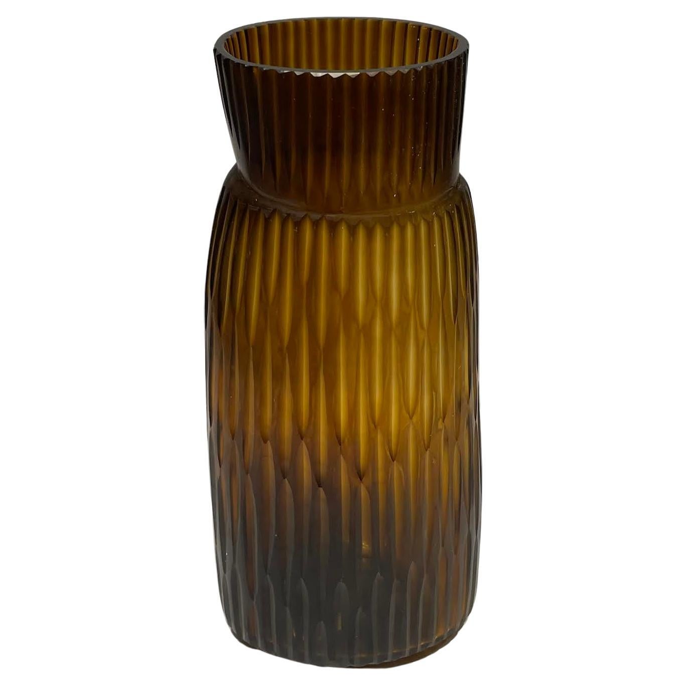 Contemporary Romanian tortoise colored thin vertical ribbed glass vase.
