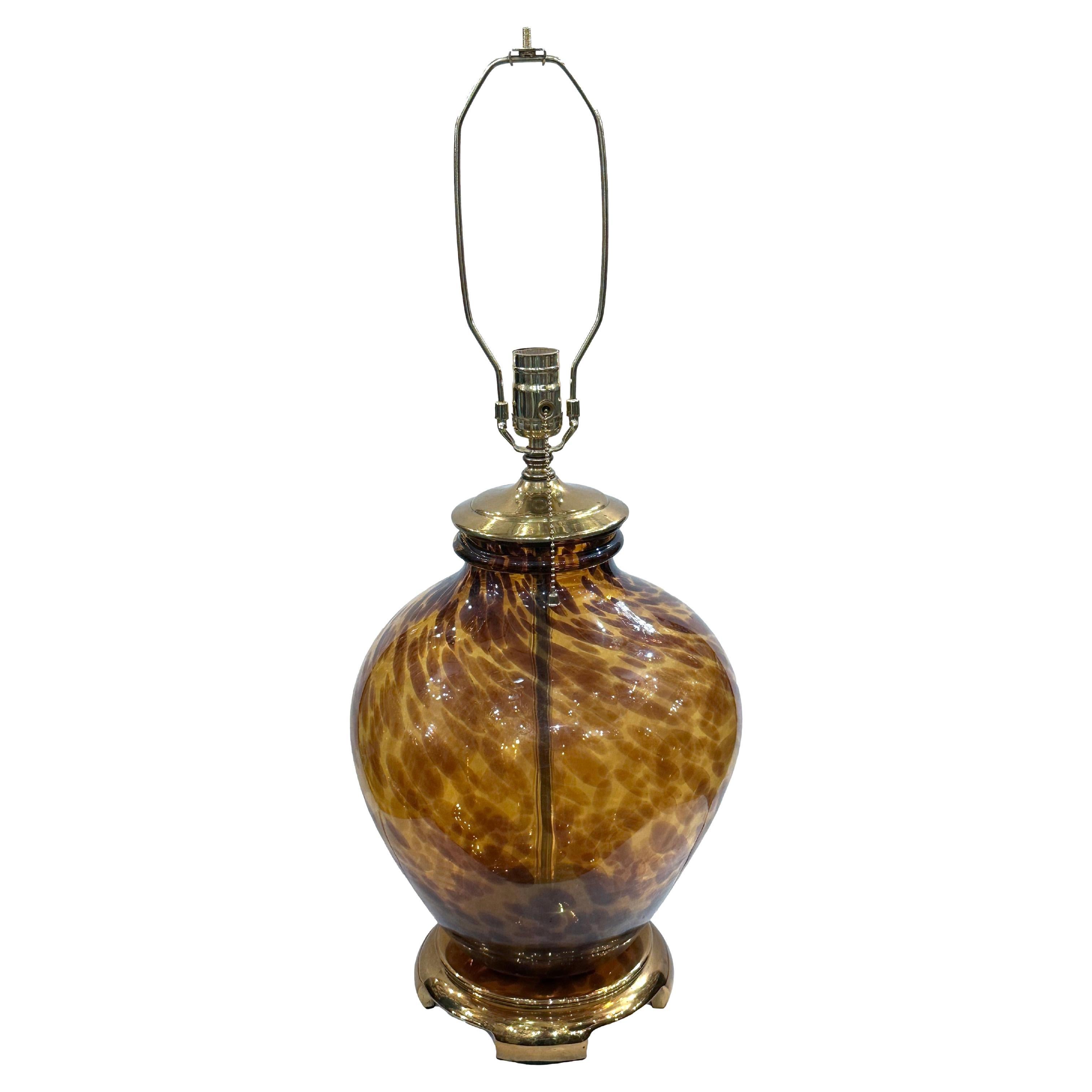 A circa 1960's Italian blown tortoise glass table lamp.

Measurements:
Diameter: 10