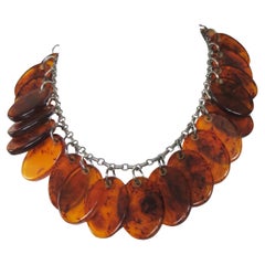 Collana a dischi in bachelite con guscio di tartaruga anni '40