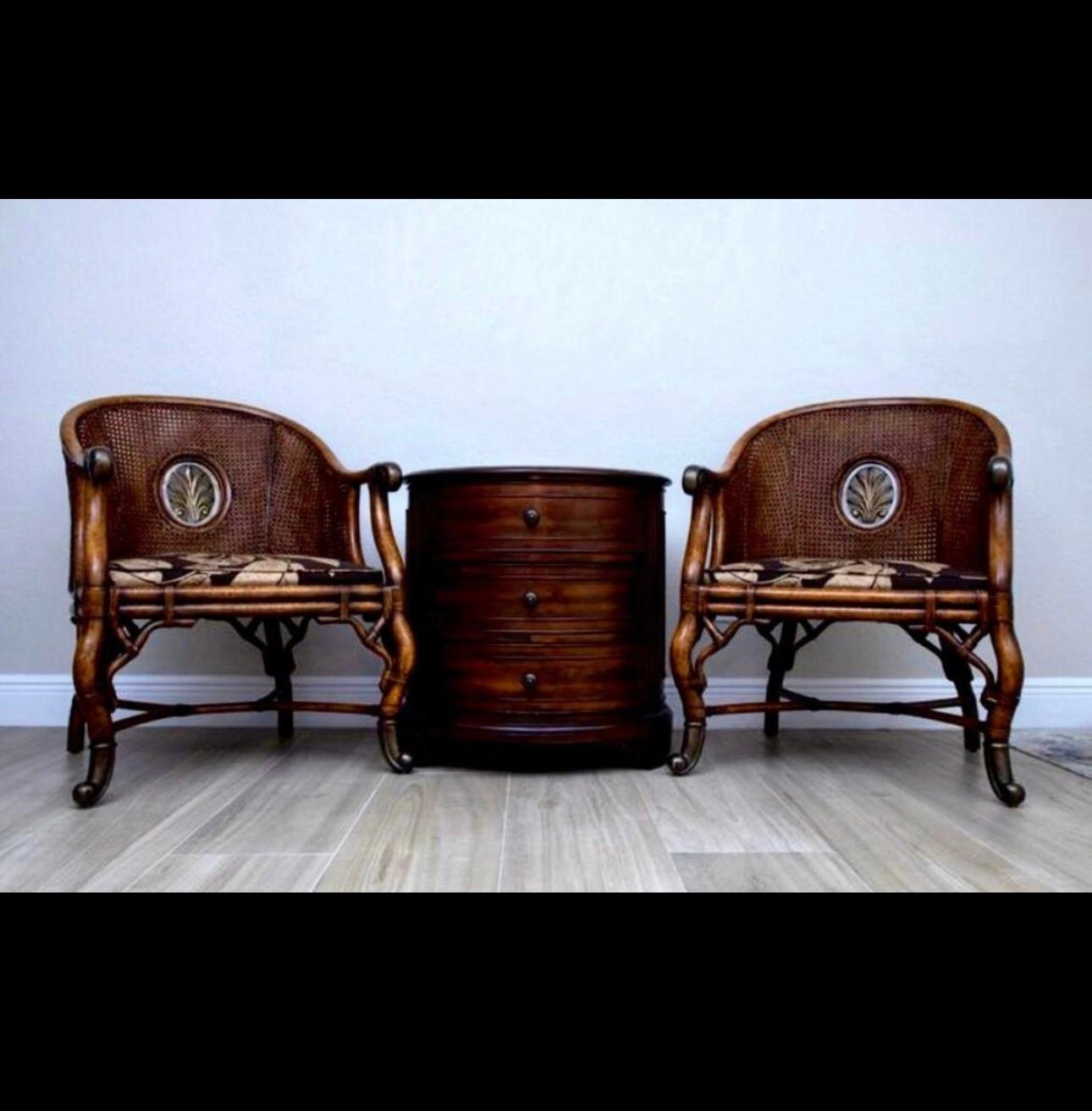 This is a one of a kind set of vintage Japanese armchairs. This style of furniture from Japan is highly sought after around the world for its unique aesthetic. 

The tortoise shell painted frame features double caning with silver gilt metal Hand