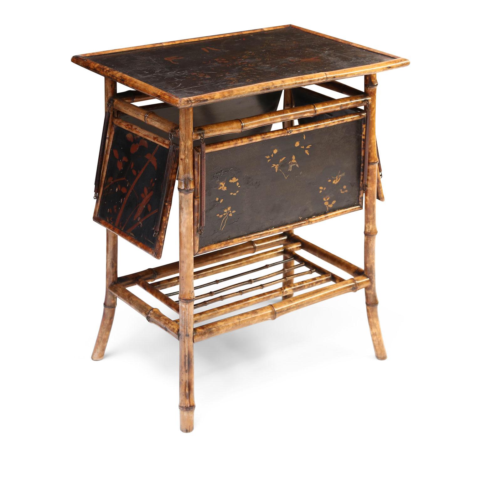 Tortoise shell bamboo dessert table: rectangular shape featuring four drop shelves suspended by springs. Surfaces of top and shelves are adorned by Japanned lacquer scenes of birds, foliage and blossoms tinted in oxblood red on black.
