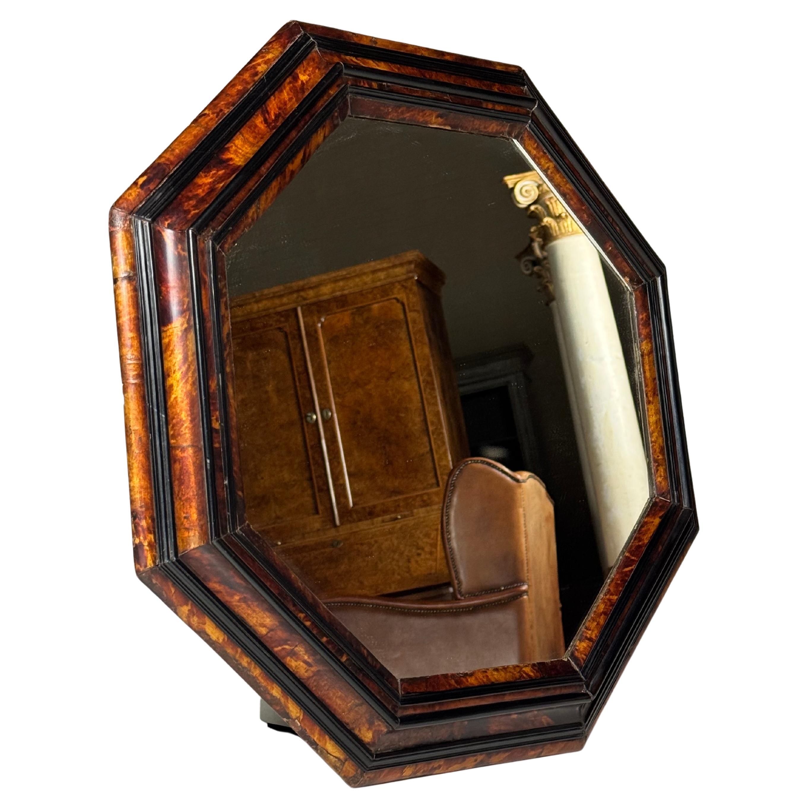 Tortoise shell mirror

Late 18th/early 19th-century tortoise shell mirror/frame.

The glass is new. In very good condition. Some minor signs of wear consistent with age.

Dimensions: 61W x 61H x 5D cm
