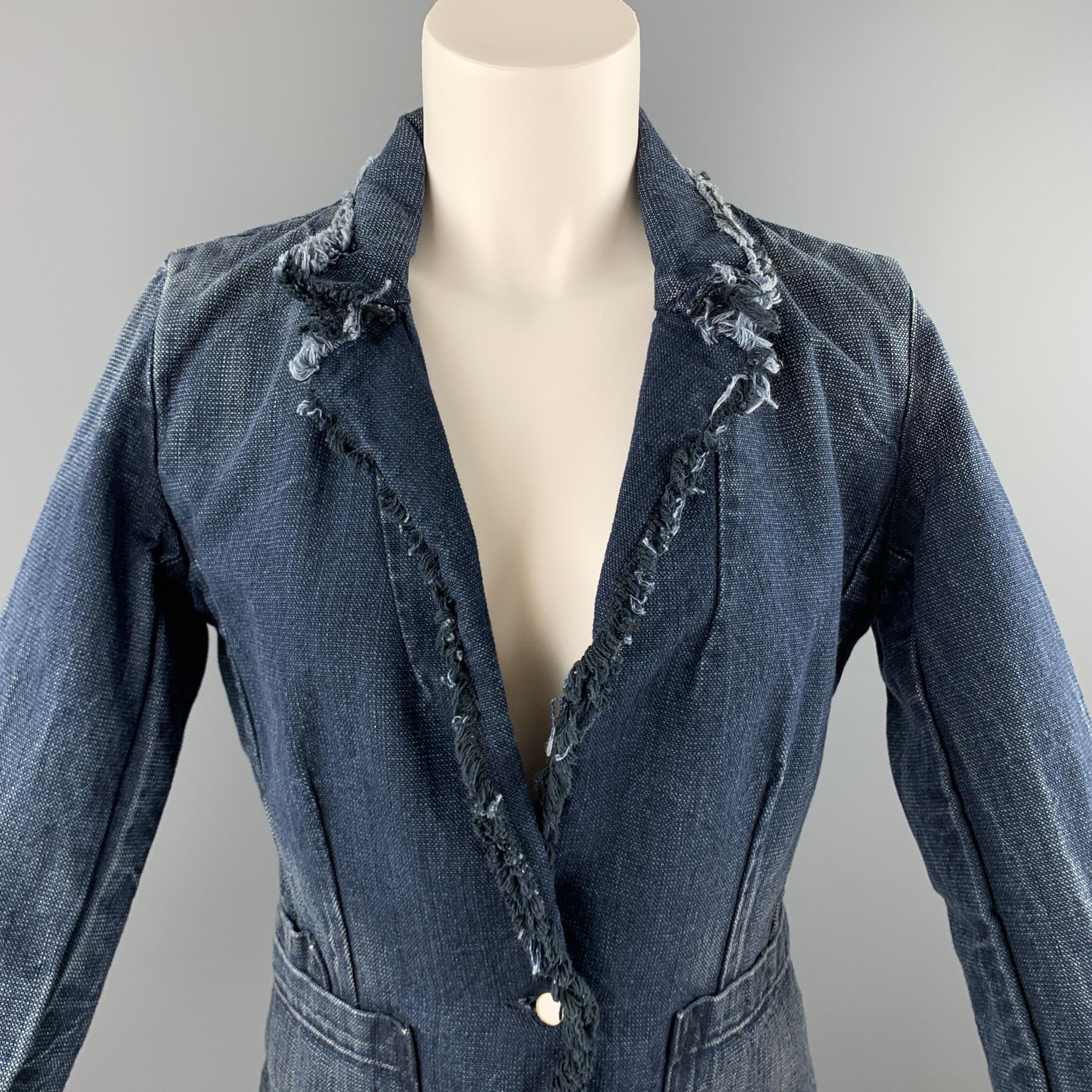 TORTOISE blazer comes in a navy distressed denim with raw hem edges featuring a notch lapel, patch pockets, and a single button closure. 

Very Good Pre-Owned Condition.
Marked: S

Measurements:

Shoulder: 15 in. 
Bust: 36 in. 
Sleeve: 38 in.