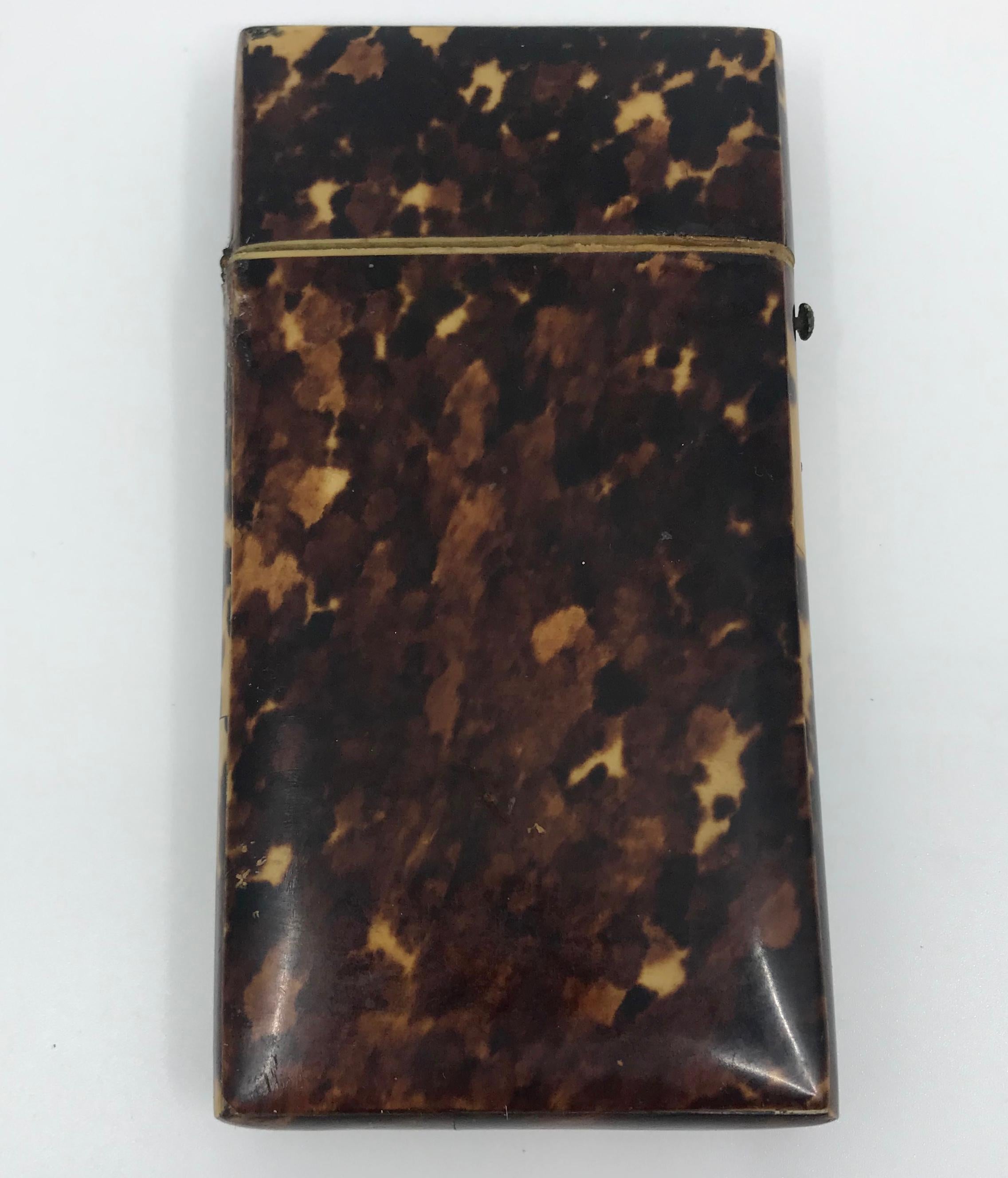 Tortoiseshell cigarette case. Antique tortoiseshell covered cigarette case with removable lid. Very richly figured tortoiseshell decorative box in shades of caramel and mahogany for display or to add to a collection. In good condition; see photos
