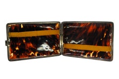Tortoiseshell cigarette case w/ silver applications all around & a hinged lid