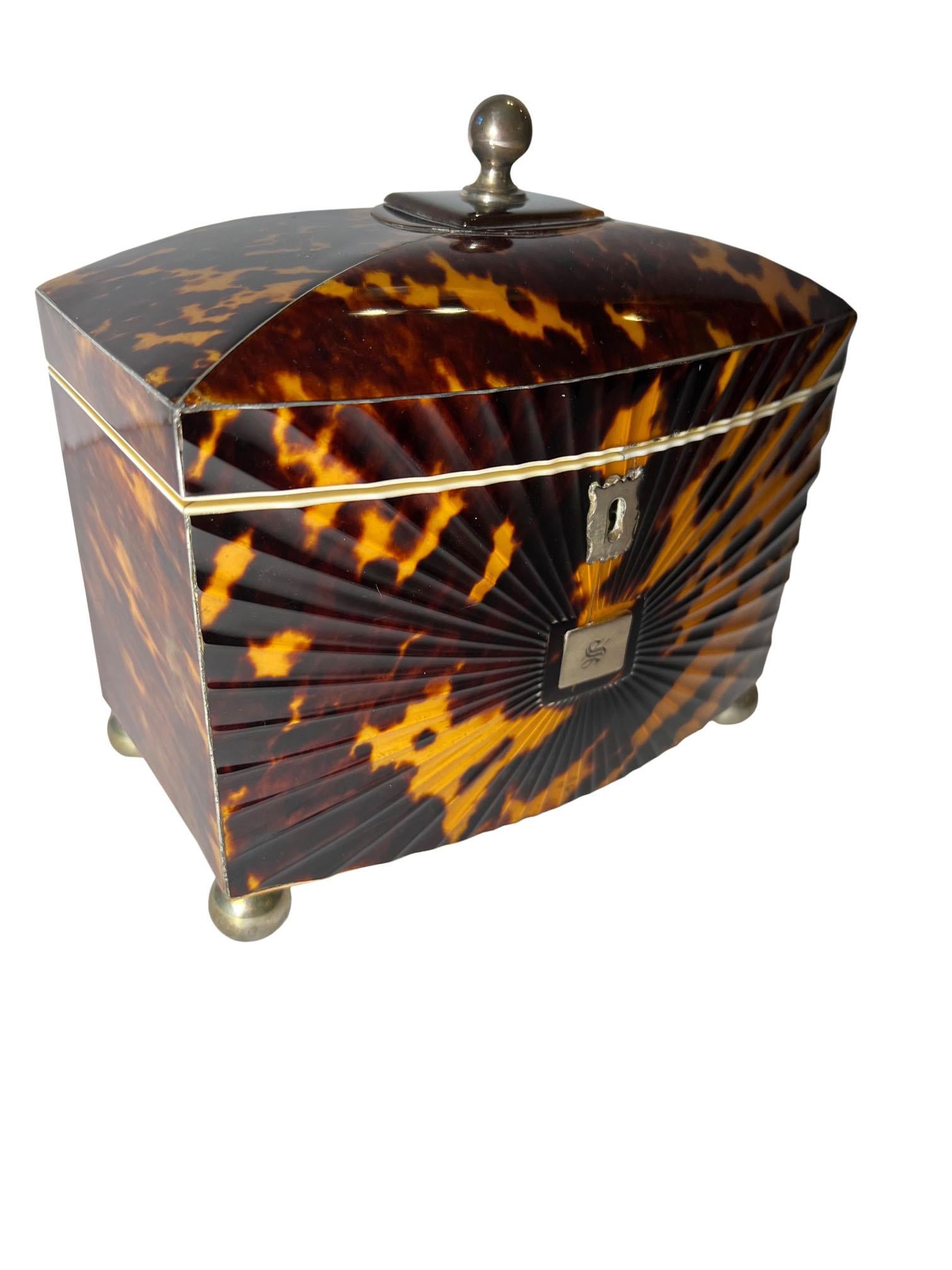 Circa 1870, English tortoiseshell tea caddy with sunburst design. It is absolutely the finest one I’ve ever owned! No cracks no restoration absolutely mint.