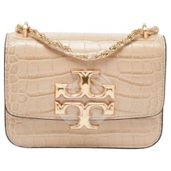 Tory Burch, petit sac à bandoulière Eleanor en cuir embossé beige
