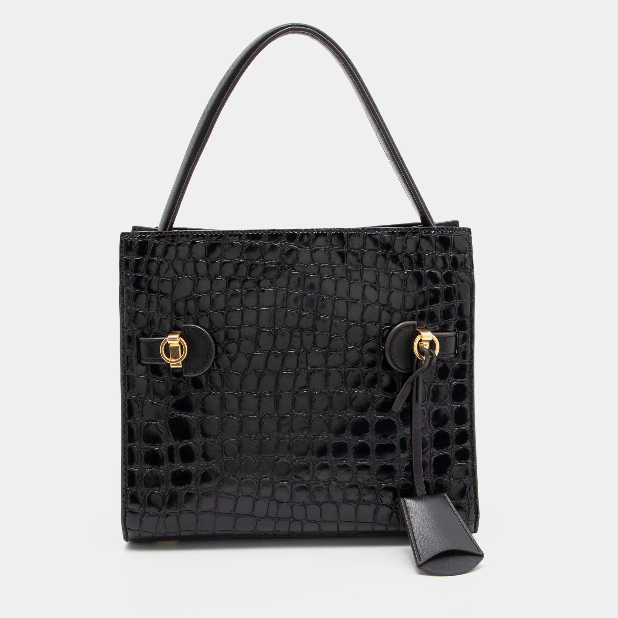 Die funktionalen und stilvollen Kollektionen dieses Designerlabels fangen die mühelose, elegante Finesse der modernen Frau ein. Diese schicke Tasche aus hochwertigem MATERIAL ist leicht zu tragen und bietet mühelos Platz für die Dinge des täglichen