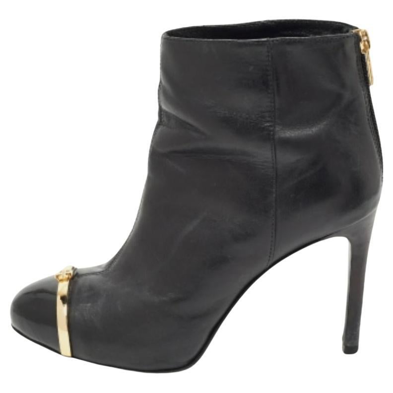 Tory Burch Stivaletti in pelle nera e vernice misura 37 in vendita