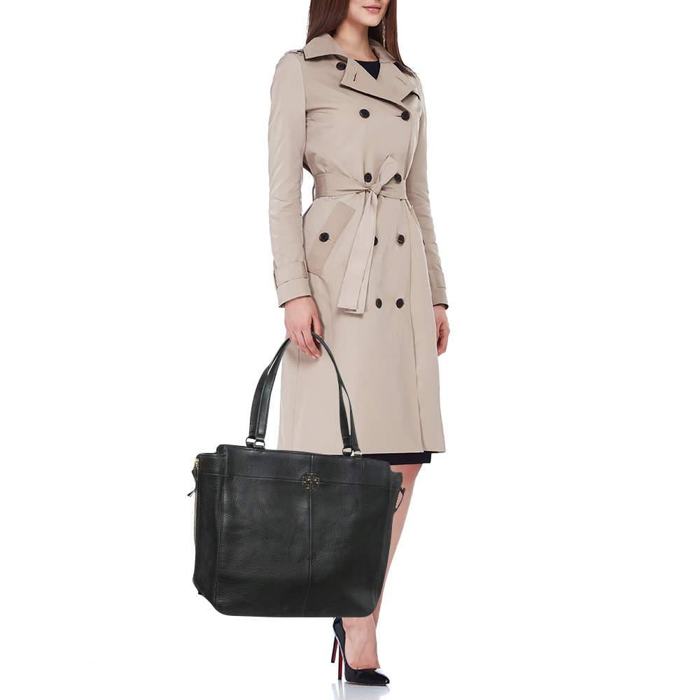 Totes like this are the perfect blend of fashion and functionality. Made from quality material on the exterior this tote has sturdy handles a spacious interior and a classy design. This tote will be your favorite accessory.
