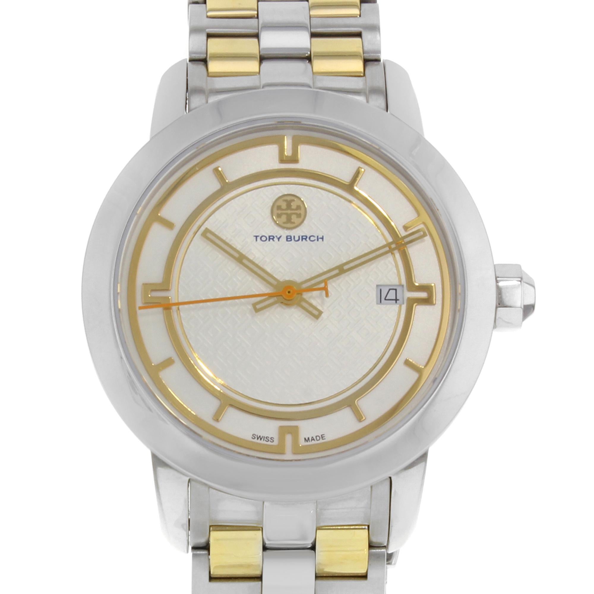 Diese gebrauchte Tory Burch N/A TRB1014 ist eine schöne Damenuhr, die von einem Quarzwerk (Batterie) angetrieben wird, das in einem Edelstahlgehäuse untergebracht ist. Es hat eine runde Form Gesicht, Datum Anzeige Zifferblatt und hat Hand Sticks