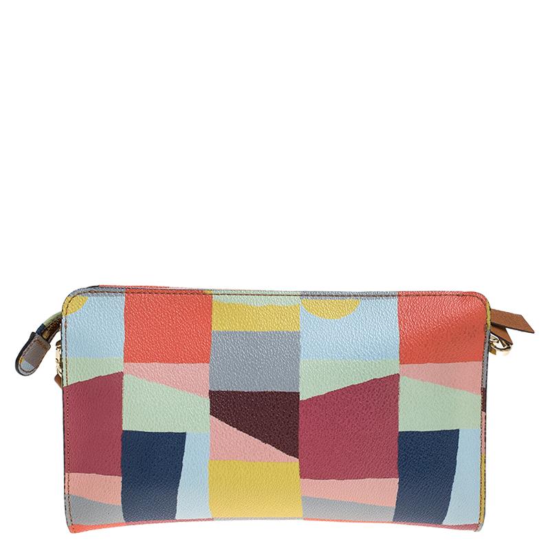 Boasting of an impressive finish, this bag offers utmost practicality. The alluring multicolor leather exterior is enhanced with the brand logo on the front. The top zip closure opens to a fabric lined interior and the bag is complete with a