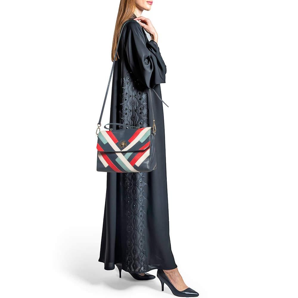 A timeless creation this bag perfectly balances simplicity with sophistication. It is created from high quality materials with a top handle to carry it around effortlessly. The perfectly sized interior of this creation will house your belongings in