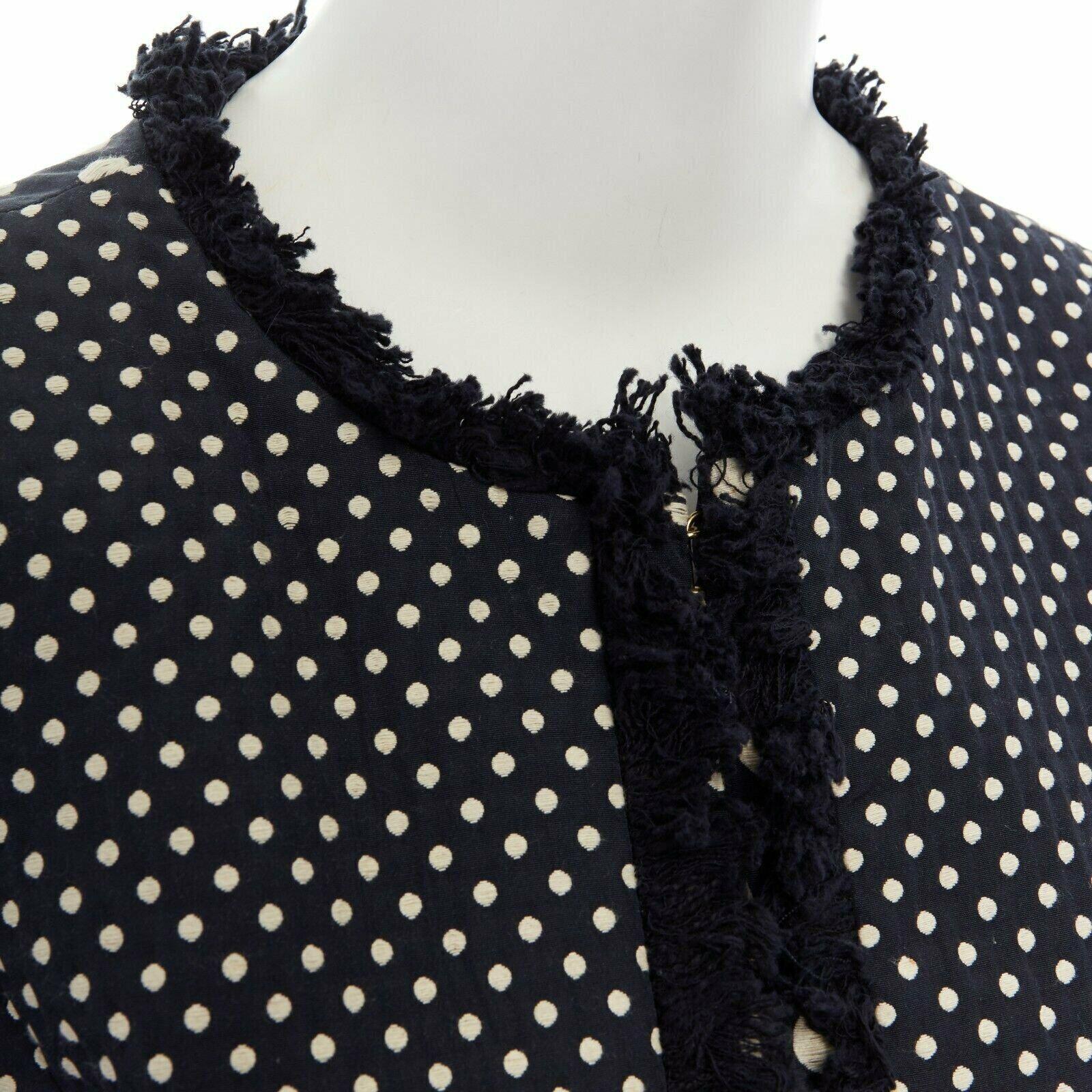 TORY BURCH navy blue white polka dot jacquard frayed trimmed coat US2 S
Reference: CC/SSLG00191
Brand: Tory Burch
Material: Cotton
Color: Blue
Pattern: Polka Dot
Extra Details: Cotton, polyester. Navy blue with white polka dot jacquard. Collarless.