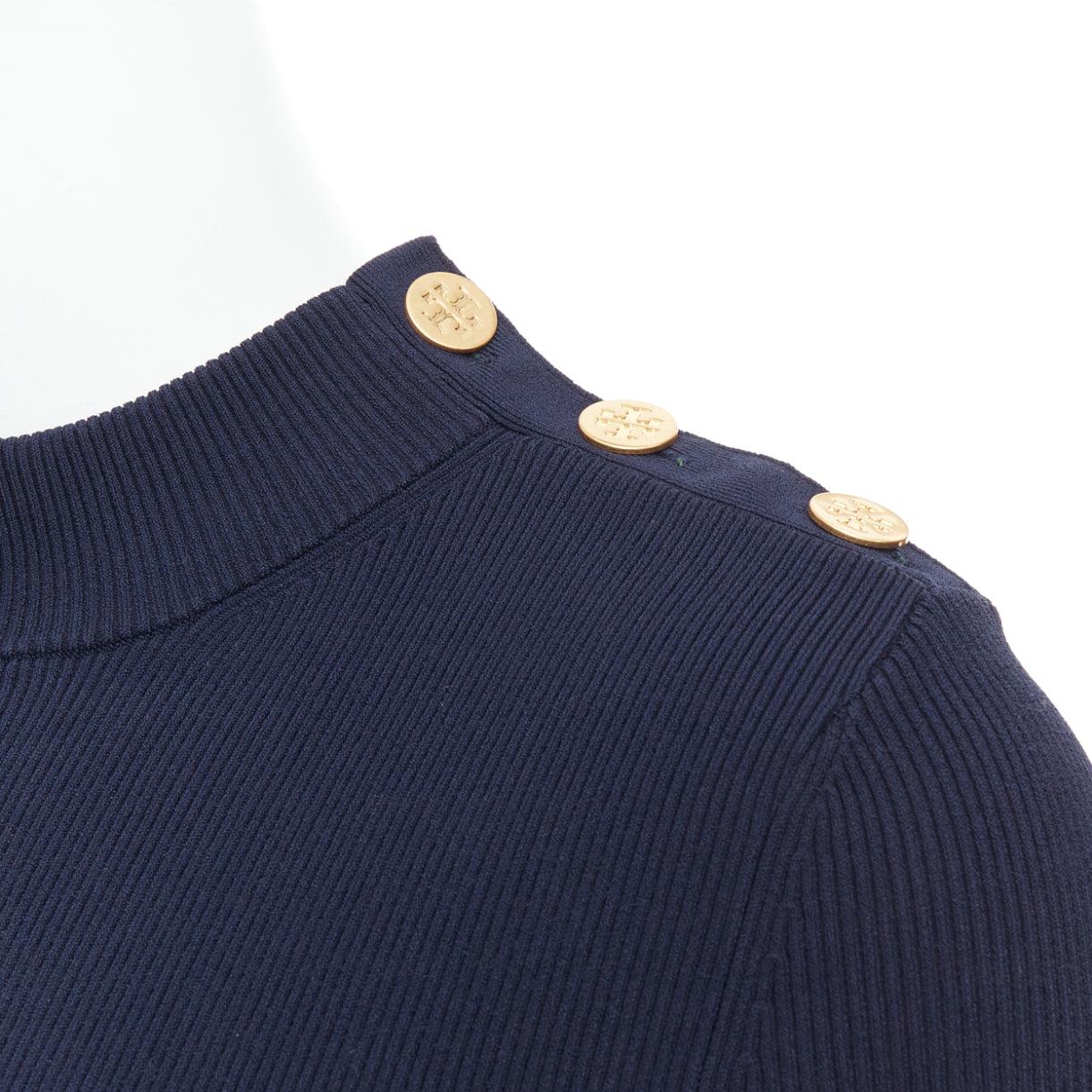 TORY BURCH navy viscose blend gold TB button ribbed pullover top M
Reference: KYCG/A00082
Brand: Tory Burch
Material: Viscose, Blend
Color: Navy, Gold
Pattern: Solid
Closure: Button
Extra Details: Logo buttons.
Made in: China

CONDITION:
Condition: