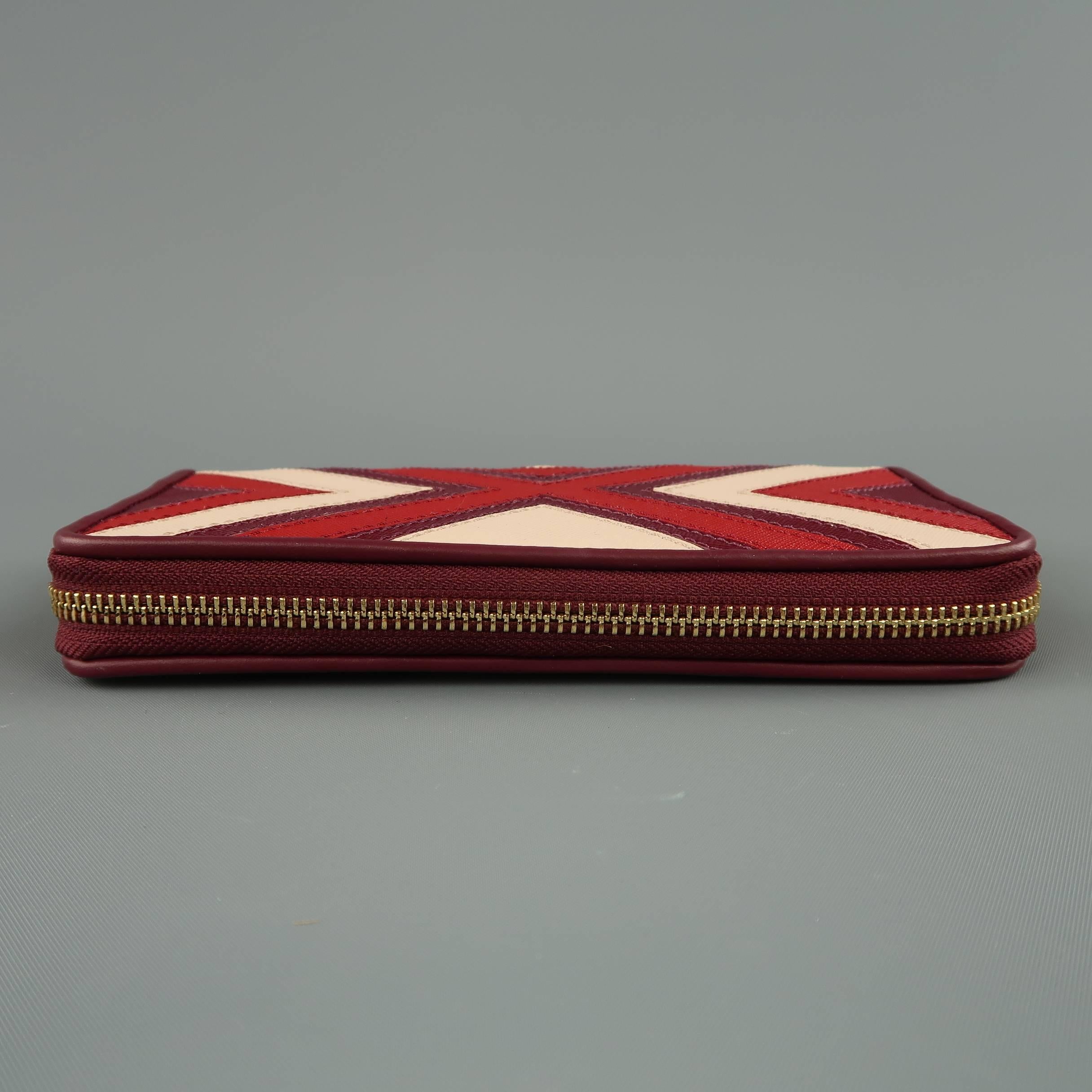 TORY BURCH Plum Red & Pink Patchwork Leather Zip Wallet In New Condition In San Francisco, CA