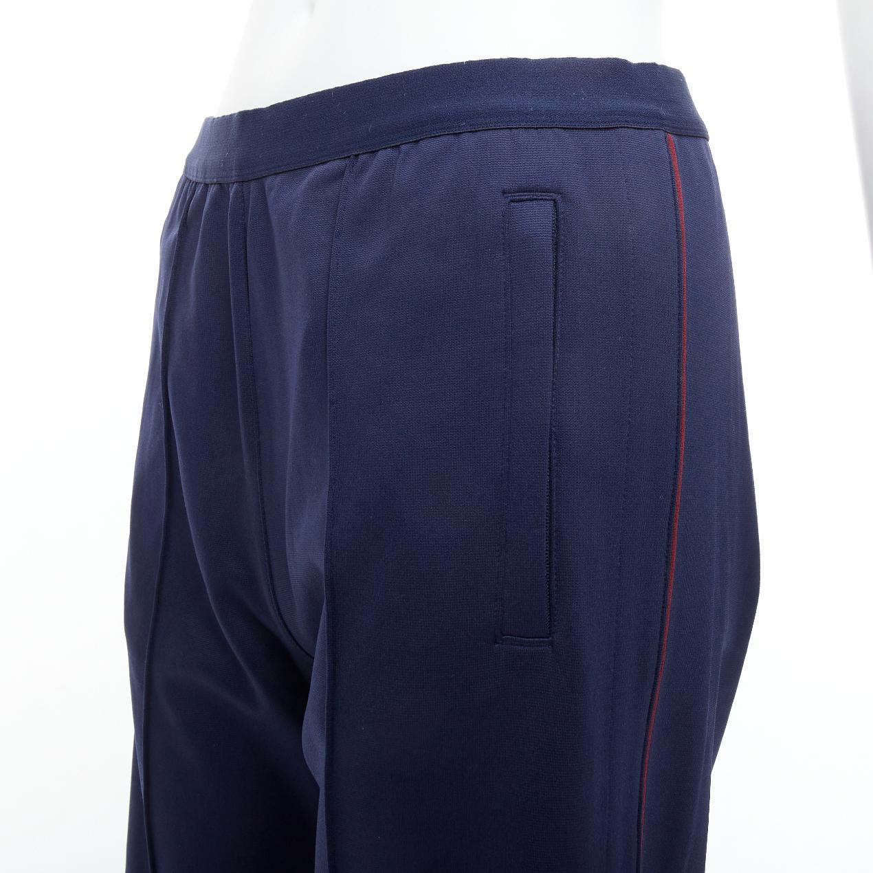 TORY BURCH SPORT navy burgundy trim wide cropped pants S
Reference: NKLL/A00300
Brand: Tory Burch
Collection: Sport
Material: Nylon, Blend
Color: Navy, Burgundy
Pattern: Solid
Closure: Elasticated
Extra Details: Snap buttons slit sides.
Made in: