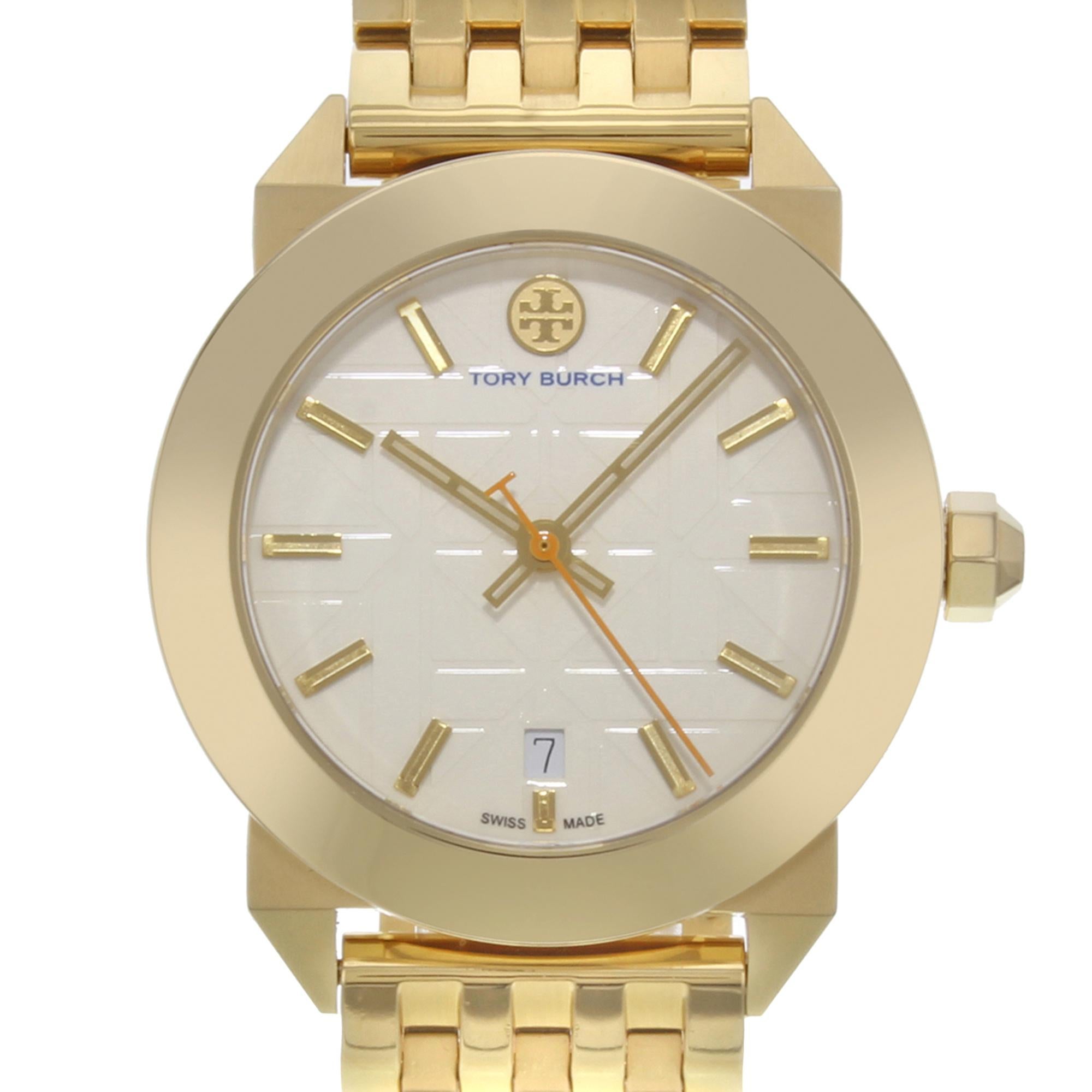 This pre-owned Tory Burch Whitney TRB8002  is a beautiful Ladie's timepiece that is powered by quartz (battery) movement which is cased in a stainless steel case. It has a round shape face, date indicator dial and has hand sticks style markers. It