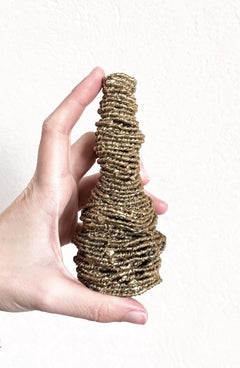 Jarrón escultural de bronce fundido «Torzadas», de Daiana Meligrana, Argentina, 2026