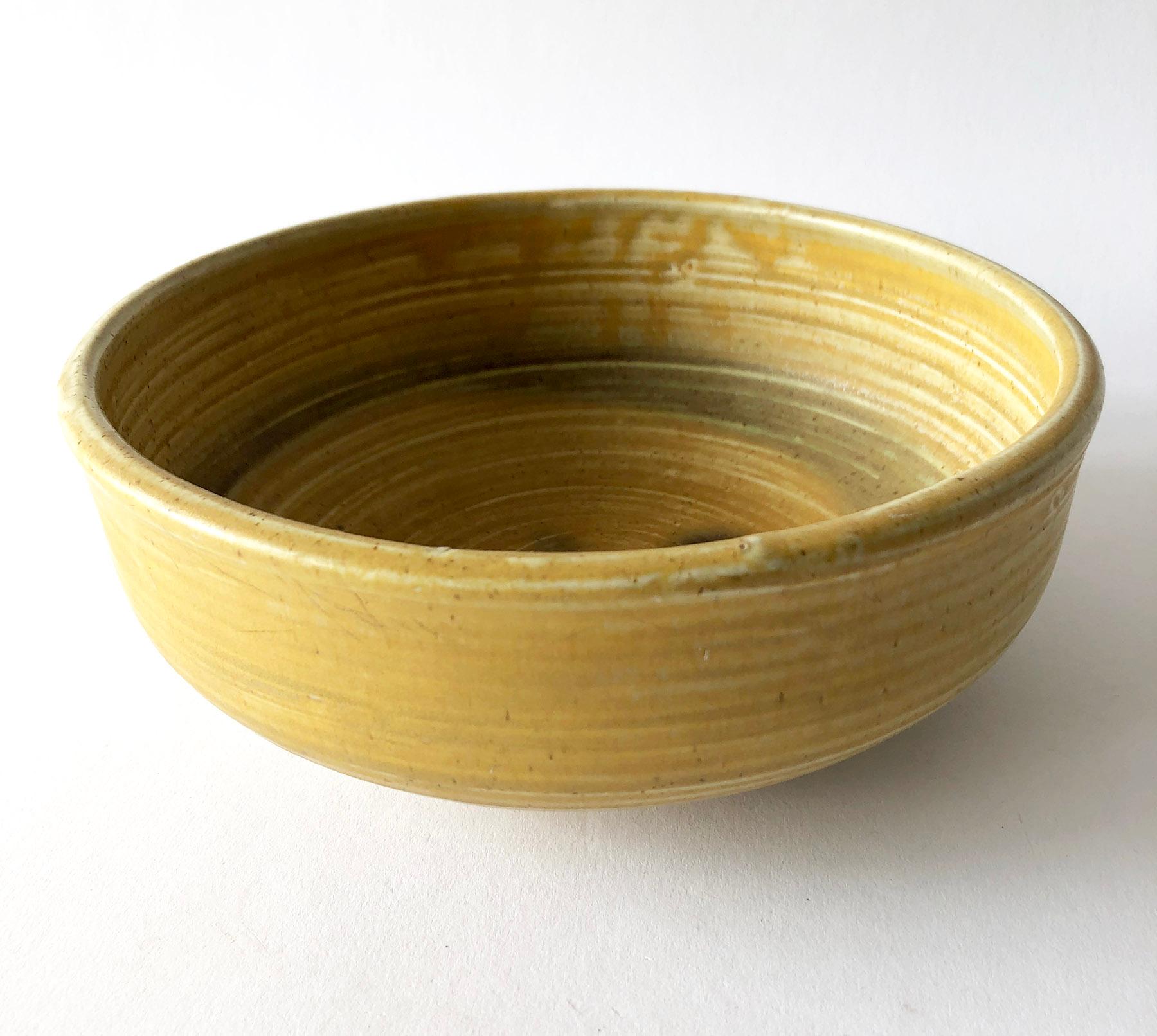 Decorative stoneware bowl with abstract design, created by Toshiko Takaezu of Honolulu, Hawaii. Bowl measures 8.5