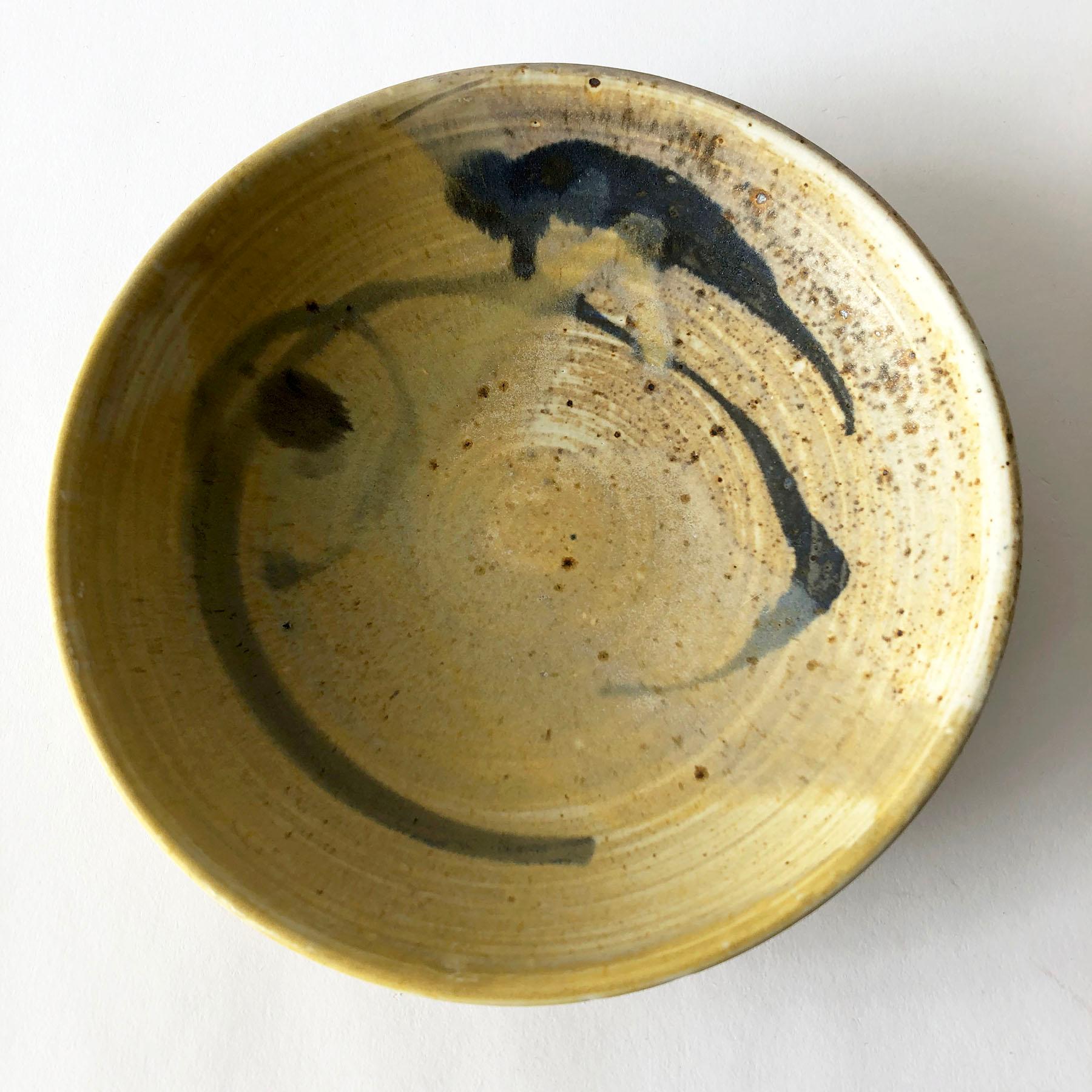 Studio pottery low bowl with abstract design created by Toshiko Takaezu, of Honolulu, Hawaii. Bowl measures 2