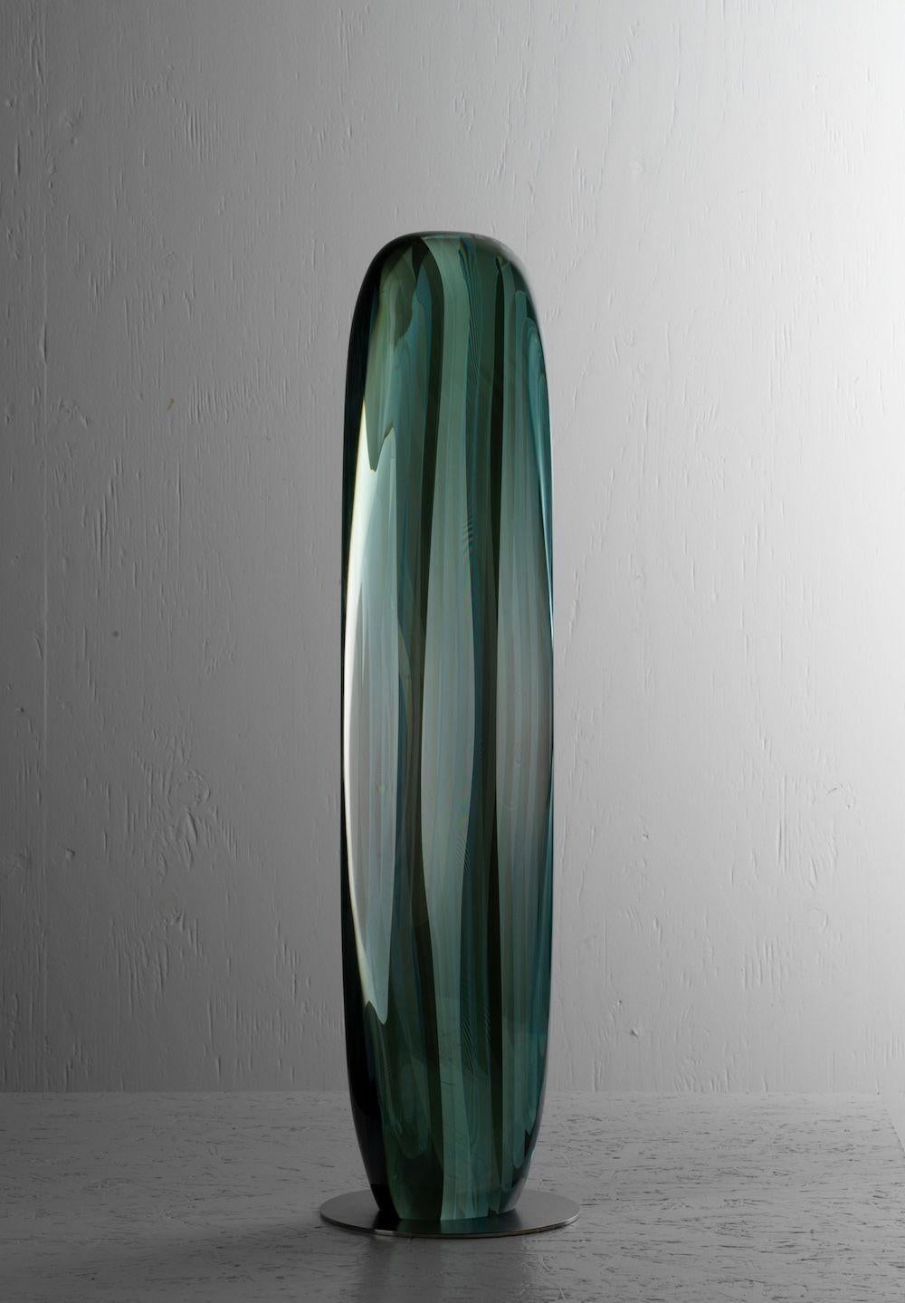 Heat reflecting glass and half mirror, 65 cm × 12 cm × 7 cm // 25.6 in x 4.7 in x 2.7 in. 
Limited edition of 5. Delivered with a certificate of authenticity signed by the artist. 
In the ‘Move’ series, which began in the 2000’s, the artist presents