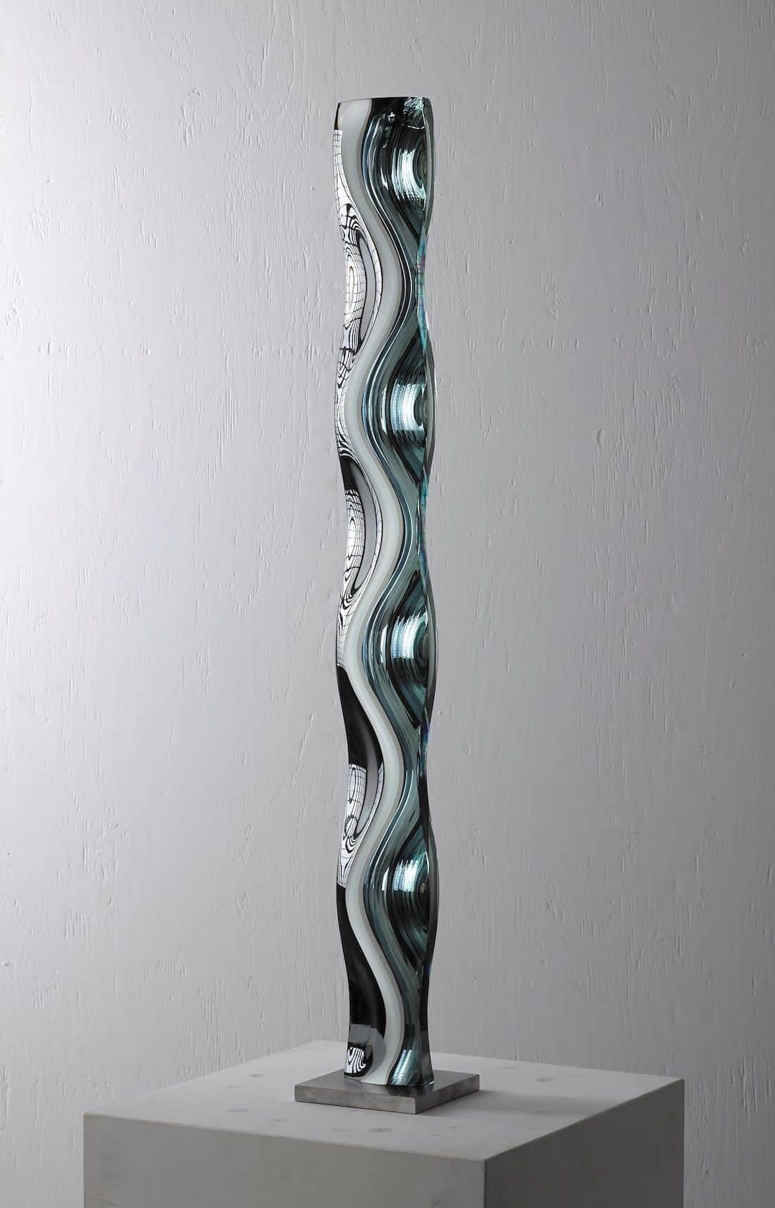 M.190402 is a glass sculpture by Japanese contemporary artist Toshio Iezumi, dimensions are 100 × 10 × 7 cm (39.4 × 3.9 × 2.8 in). 
The sculpture is signed and numbered, it is part of a limited edition of 5 editions and comes with a certificate of