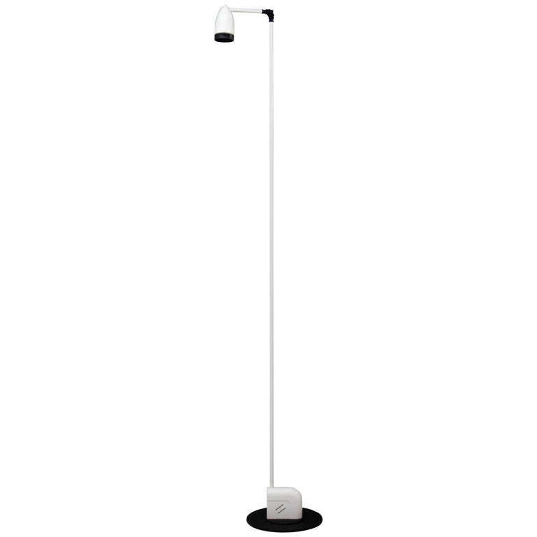 Floor standing halogen spotlight 'Terra' designed by Toshiyuki Kita for Luci Italia. The slim lamp post rotates on the base and the two joints near the top hinge vertically, 1980s.