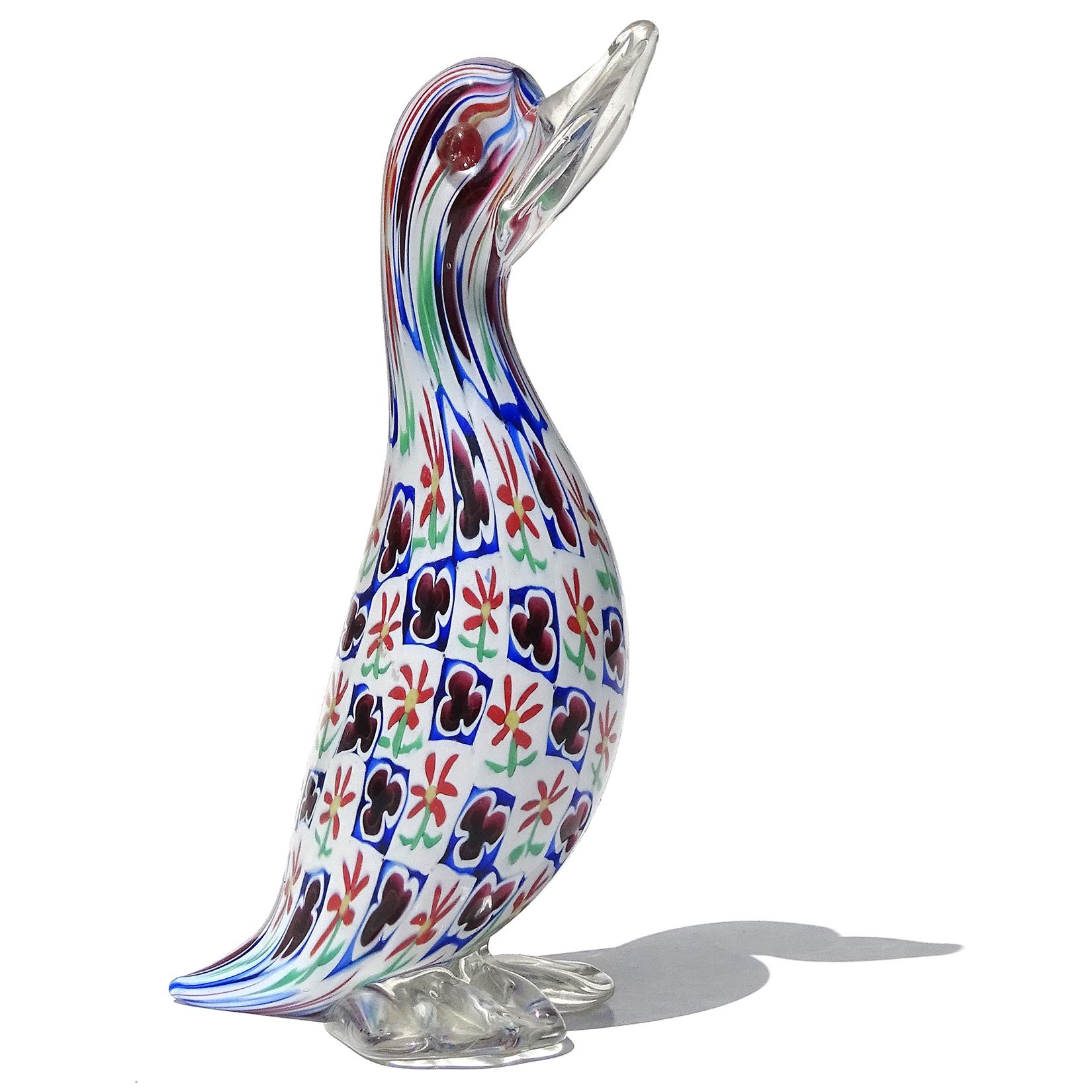 Beautiful vintage Murano hand blown Millefiori Murrina daisy flowers and clovers Italian art glass duck bird figurine / sculpture. Documented to the Fratelli Toso company. The 2 different murrines in the body create a unique checker board