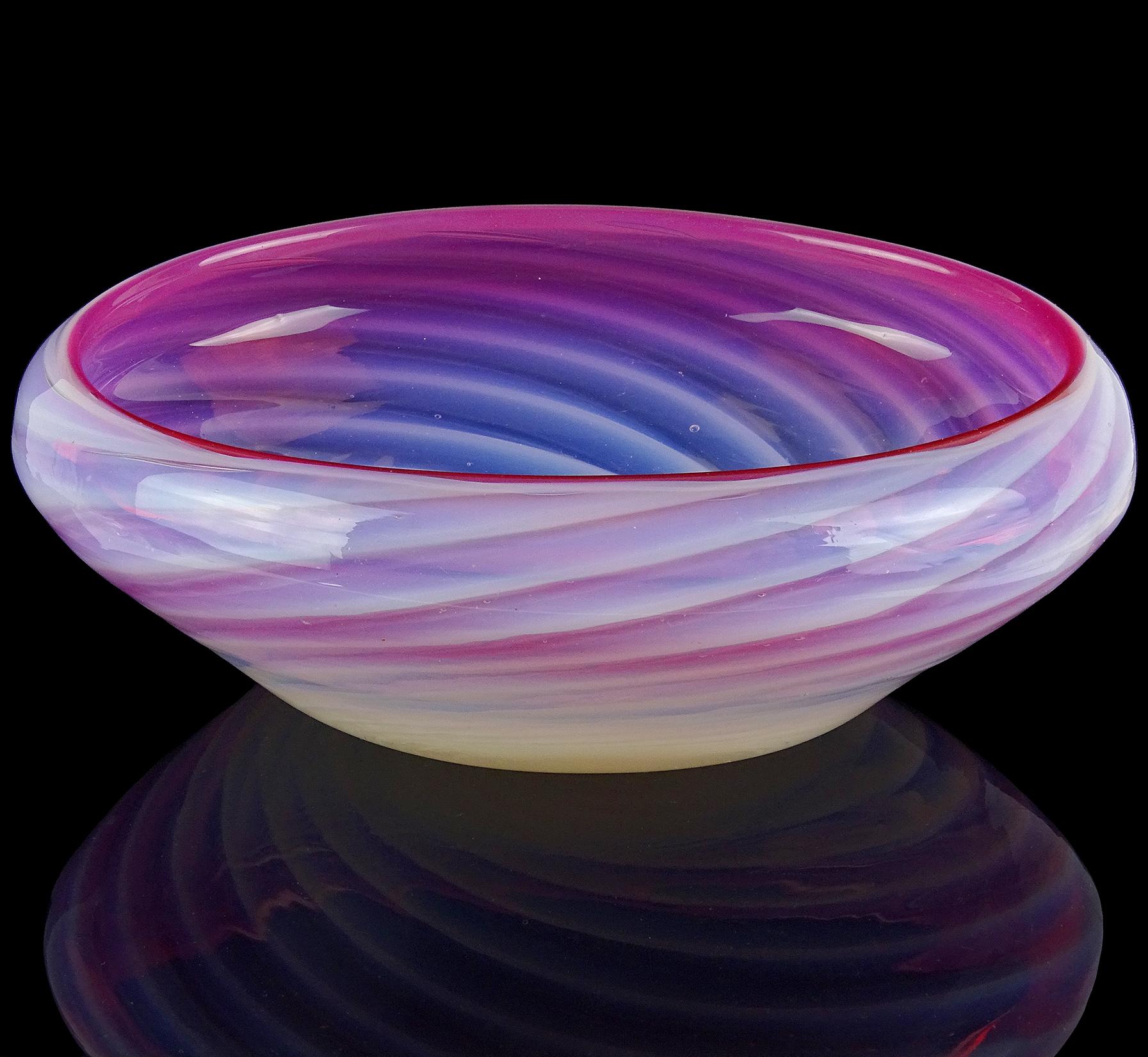 Beautiful large vintage Murano hand blown white opalescent swirl with pink rim Italian art glass centerpiece bowl. Documented to the Fratelli Toso company. Made with thick glass, in an oval shape. Can be used as a display piece on any table. Use it