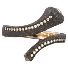 Stud ring with antique cut diamonds in iron and gold