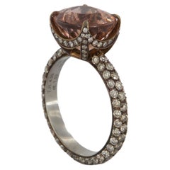 Tosti ring with orange pink tourmaline carat 4, 99 and brown diamonds in titanium
