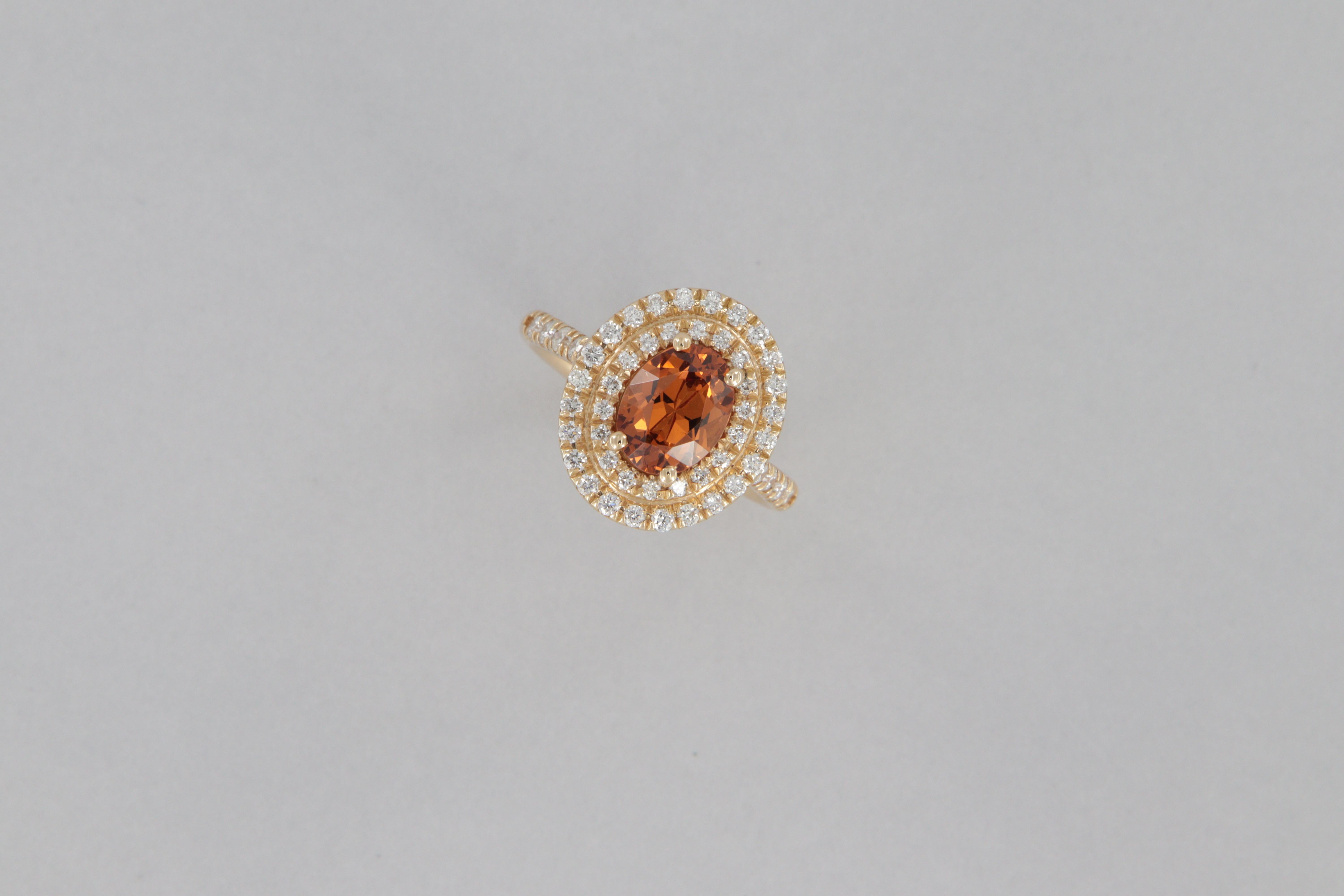 18k yellow gold ring , weight g  4.4, with oval orange garnet, carat weight 1.70 and decorated with round brilliant-cut diamonds, carat weight 0.56, clarity VS, color G.
The measurements of the oval of the ring are mm 15 x 12.9.
You can customize