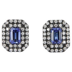 Tosti halo earrings with diamonds and tanzanites carat 1.41 in gold