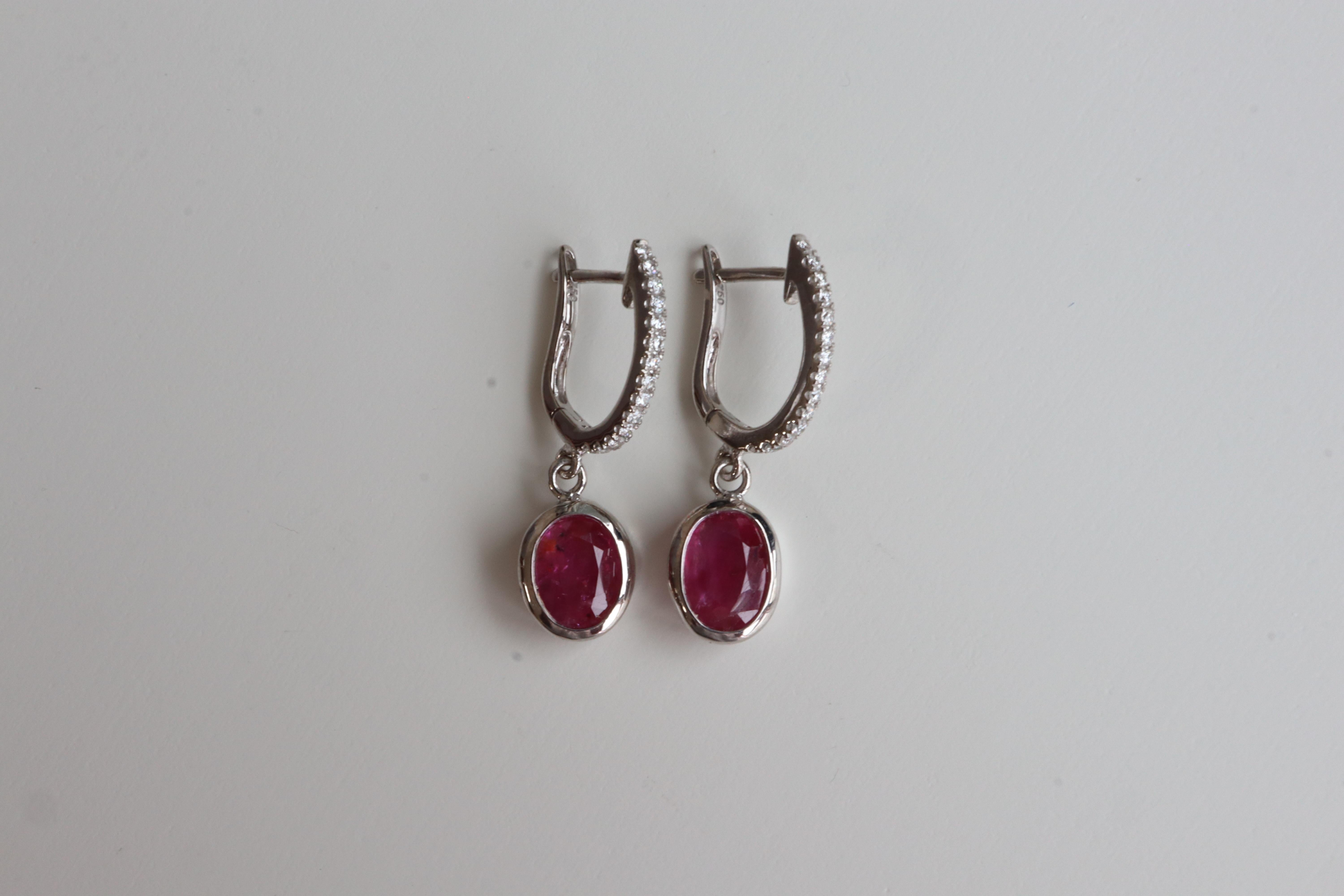 Kindly note that the stated price for this item is fixed and non-negotiable.
We appreciate your understanding and respect for our pricing decision.

Features :

Main Gemstone - Ruby
Total Carat Weight (2pcs) - 2.39Ct
Measurement of ruby -