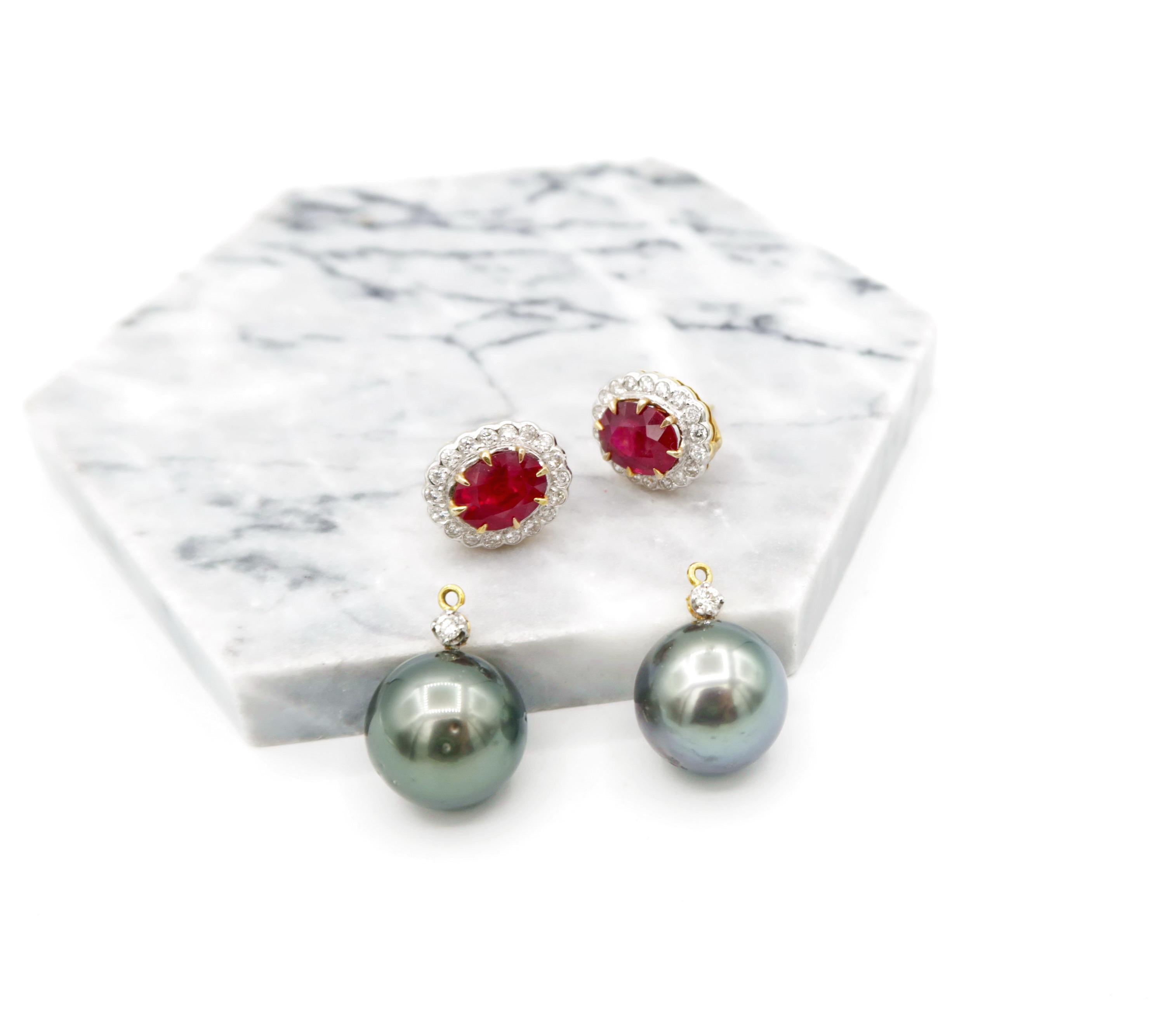 Oval-Shaped Ruby Drop Earrings in 18K Yellow Gold embellished with Diamond and Tahitian Pearls

Ruby : 4.67cts.
Diamond : 0.66ct.
Gold : 18K yellow gold 6.928g.
Pearls: Tahitian Pearls 2pcs.