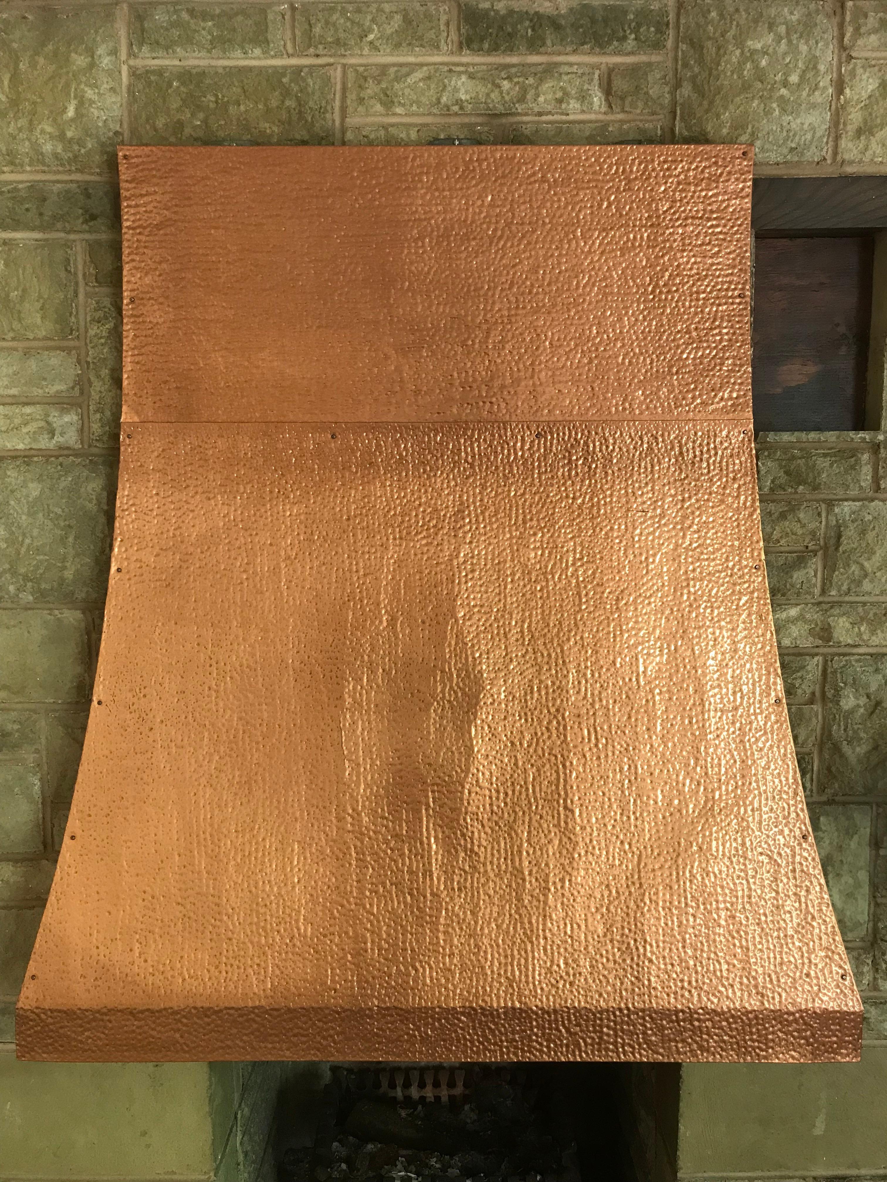 hammered copper fireplace surround