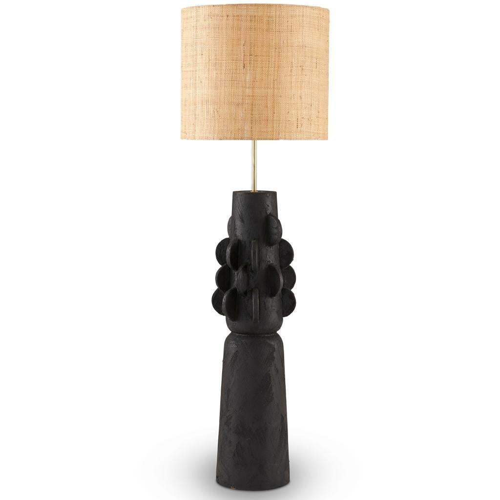 The Totem lamp collection is inspired by Brutalist forms. Each piece is finished with hand applied details which gives it a hand crafted aesthetic. The terracotta base is finished in textured black Jesmonite plaster, once gain applied by hand so