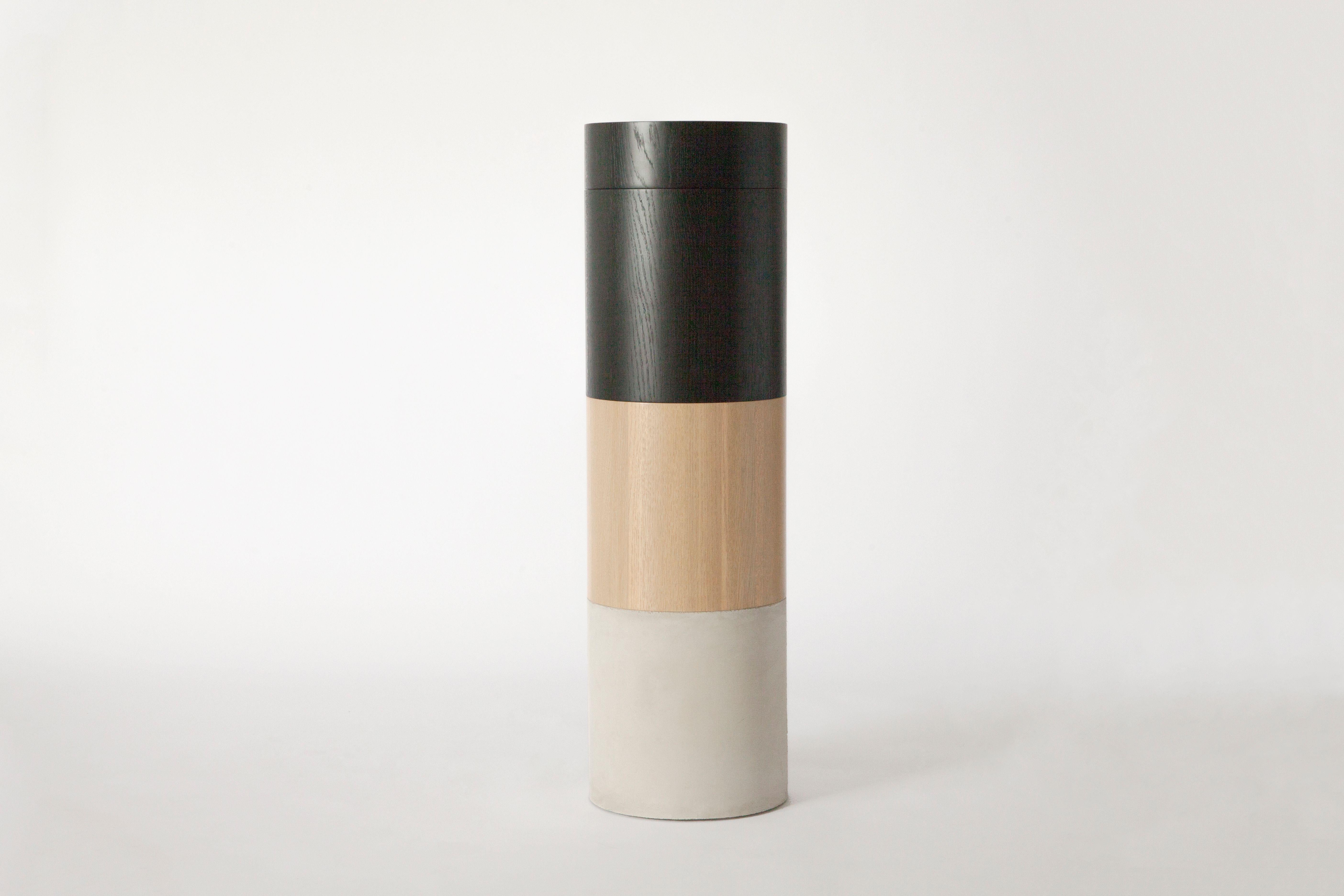 TOTEM by Estudio Persona
Dimensions: D 33 x H 109.5 cm
Materials: Solid ash, concrete base

Sculptural console composed of two stackable stools and a side table.
Made in solid ash (stained black and natural) with a concrete base, finished with