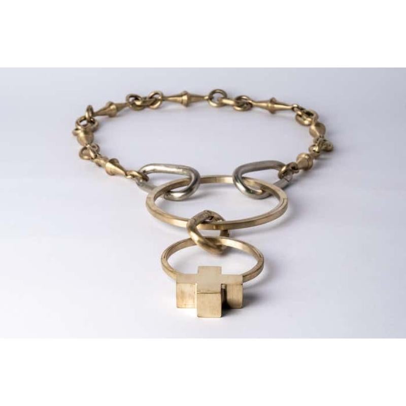 Totemic chain necklace made from combination of brass and bronze.
The Charm System is an interrelated group of products that can be mixed and matched or worn individually.
Chain length (closure to closure): 715 mm
Mini plus on portal length: 79 mm