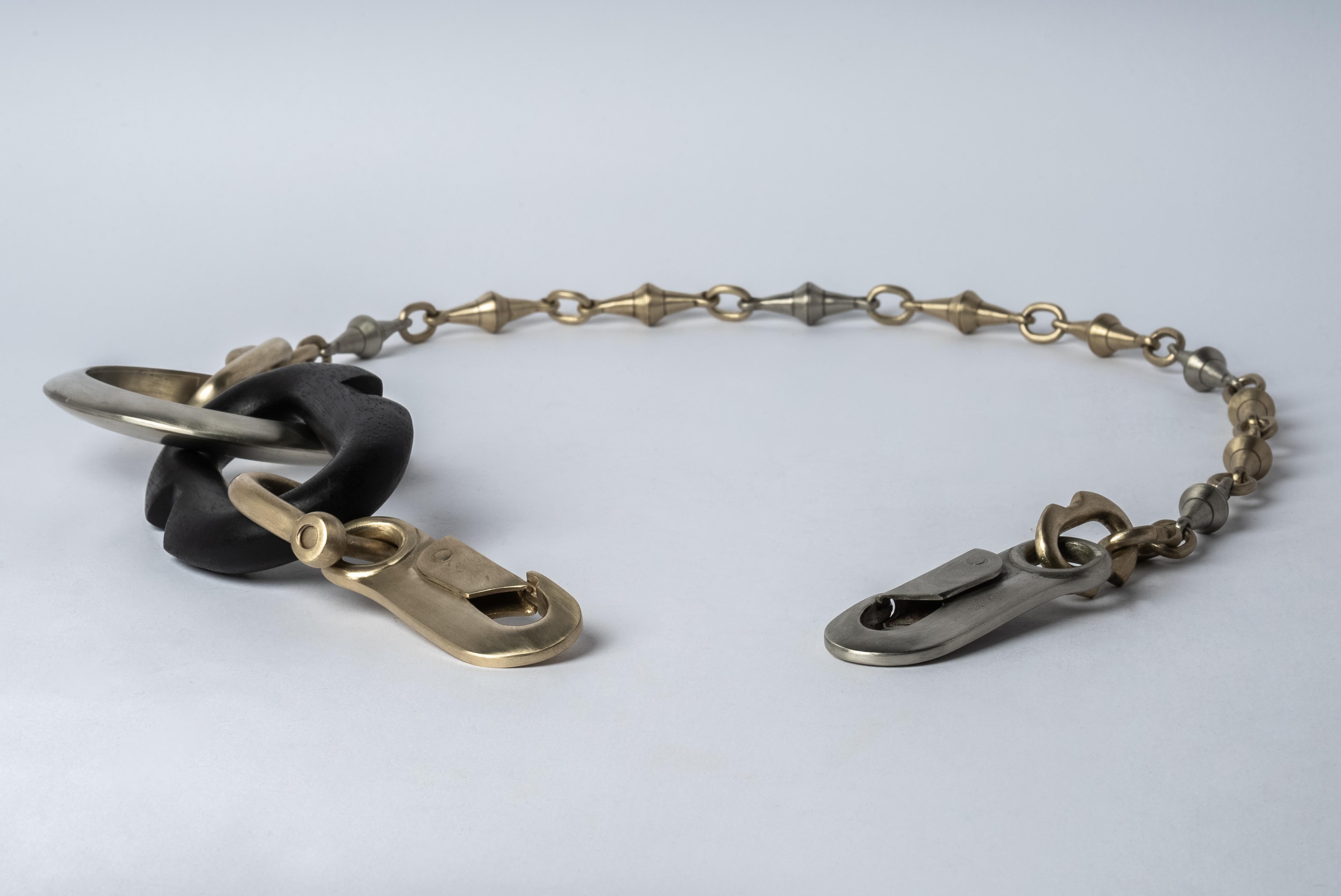 Totemic chain necklace made from combination of wood, brass and bronze.
The Charm System is an interrelated group of products that can be mixed and matched or worn individually.
Chain length (closure to closure): 855 mm