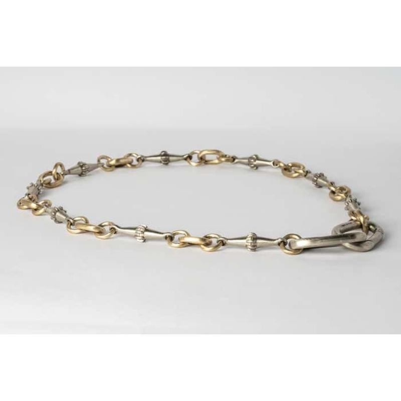 Totemic chain necklace in combination of bronze and brass
Chain length (closure to closure): 700 mm