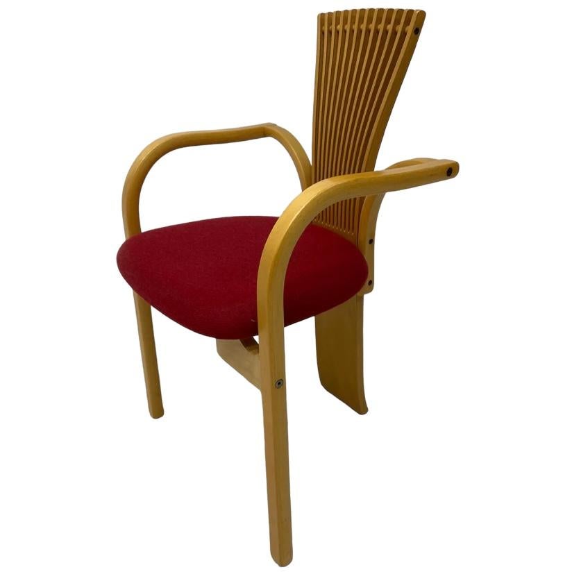 An incredibly beautiful vintage 80s Memphis style Totem chair designed by Norwegian Torstein Nilsen for Bo Mobler. The postmodern chair is designed like a fan, has bentwood arms & a wine coloured wool seat. The frame, arms & legs are in beech. The
