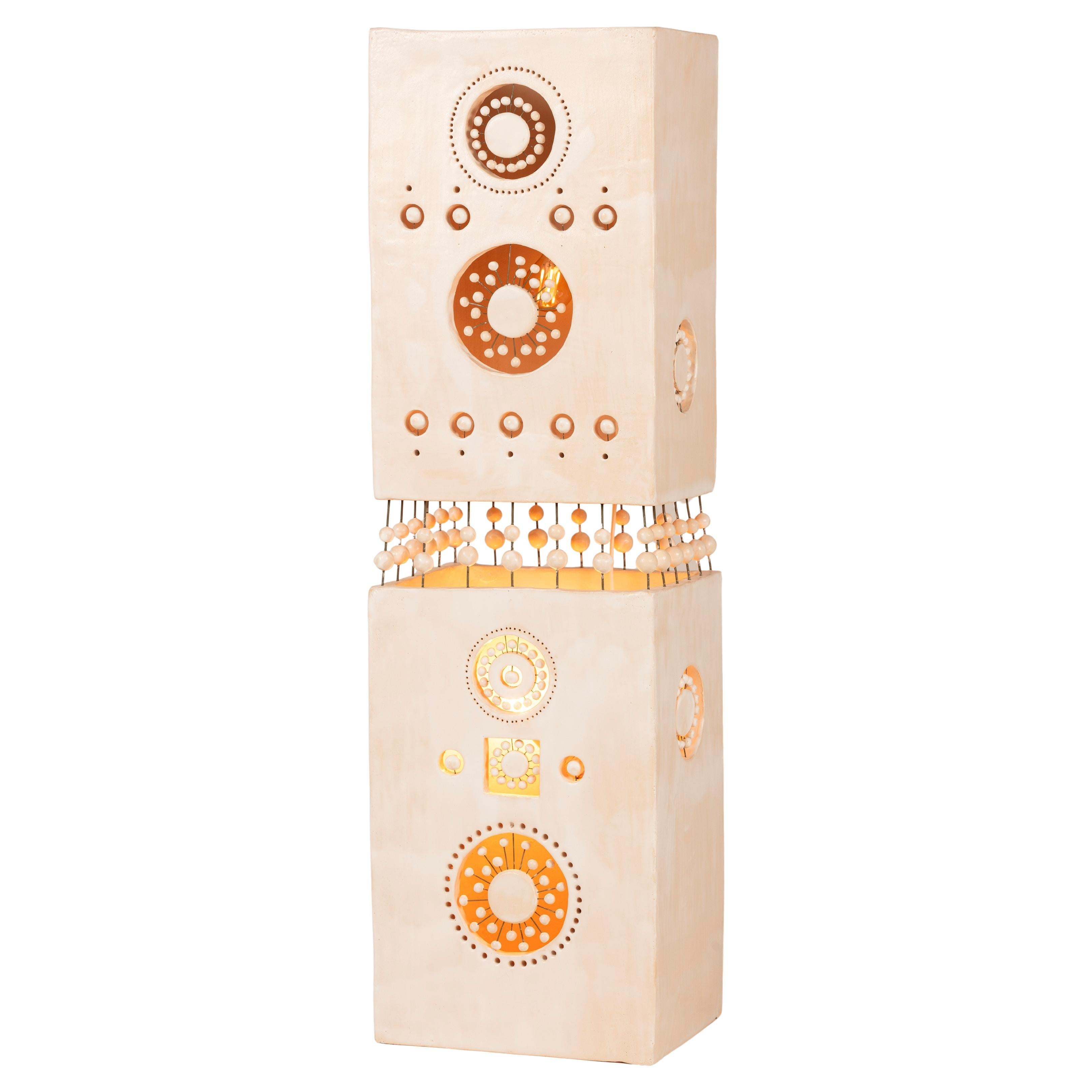 Rare Totem Column by georges and Benjamin Pelletier in white enamelled ceramic, as all the Georges Pelletier ceramics, this Totem Column is bringing to your space an amazing light experience when the night falls, and a stunning sculptural presence