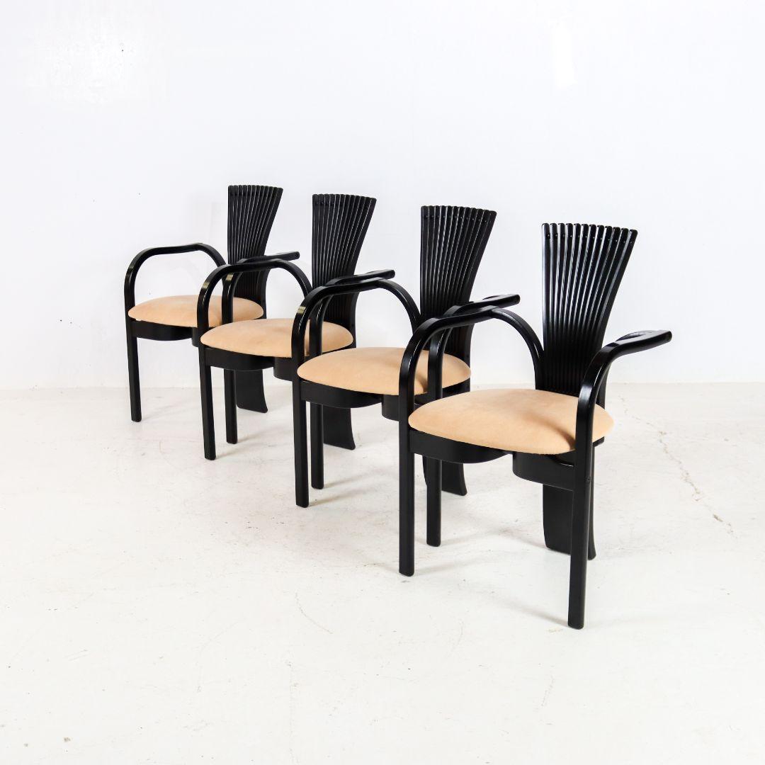 This rare set of four chairs was designed in Norway in 1984 by Torstein Nilsen for Westnofa. The chair is of very luxurious and high quality and made of natural oak lacquered in black. The fabric is made of soft suede. The loose legs of the 'fan