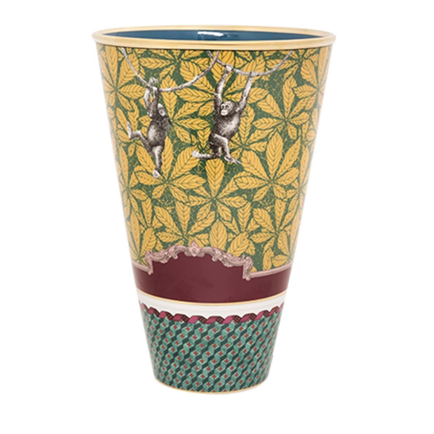 This stunning porcelain vase is part of the Totem Collection, whose eclectic design and vivid colors are inspired by nature in the style of 18th century opulent home decoration. In this piece, the truncated cone-shaped vase is adorned with a green