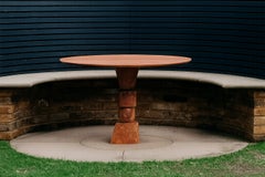 Totem Sculptural Table by on.Entropy, in Red Travertine, customisable