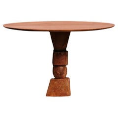 Totem Sculptural Table by on.Entropy, in Red Travertine, customisable