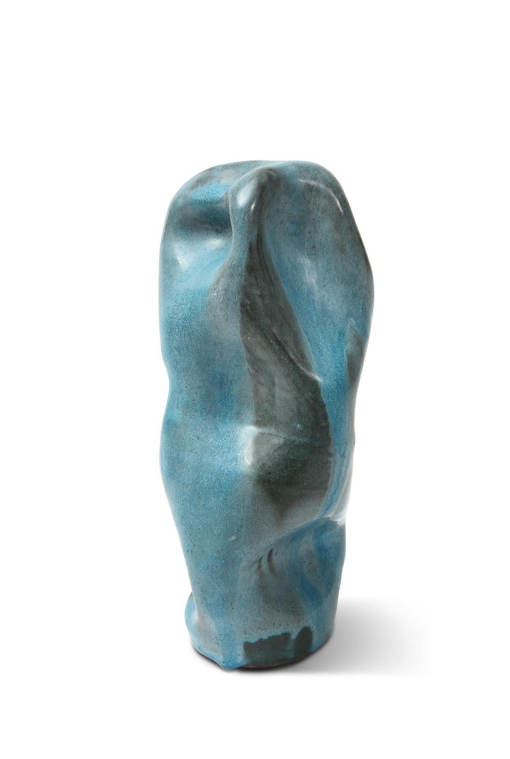 Totem sculpture with folds #2 by David Haskell. Ceramic sculpture with blue glazes.
